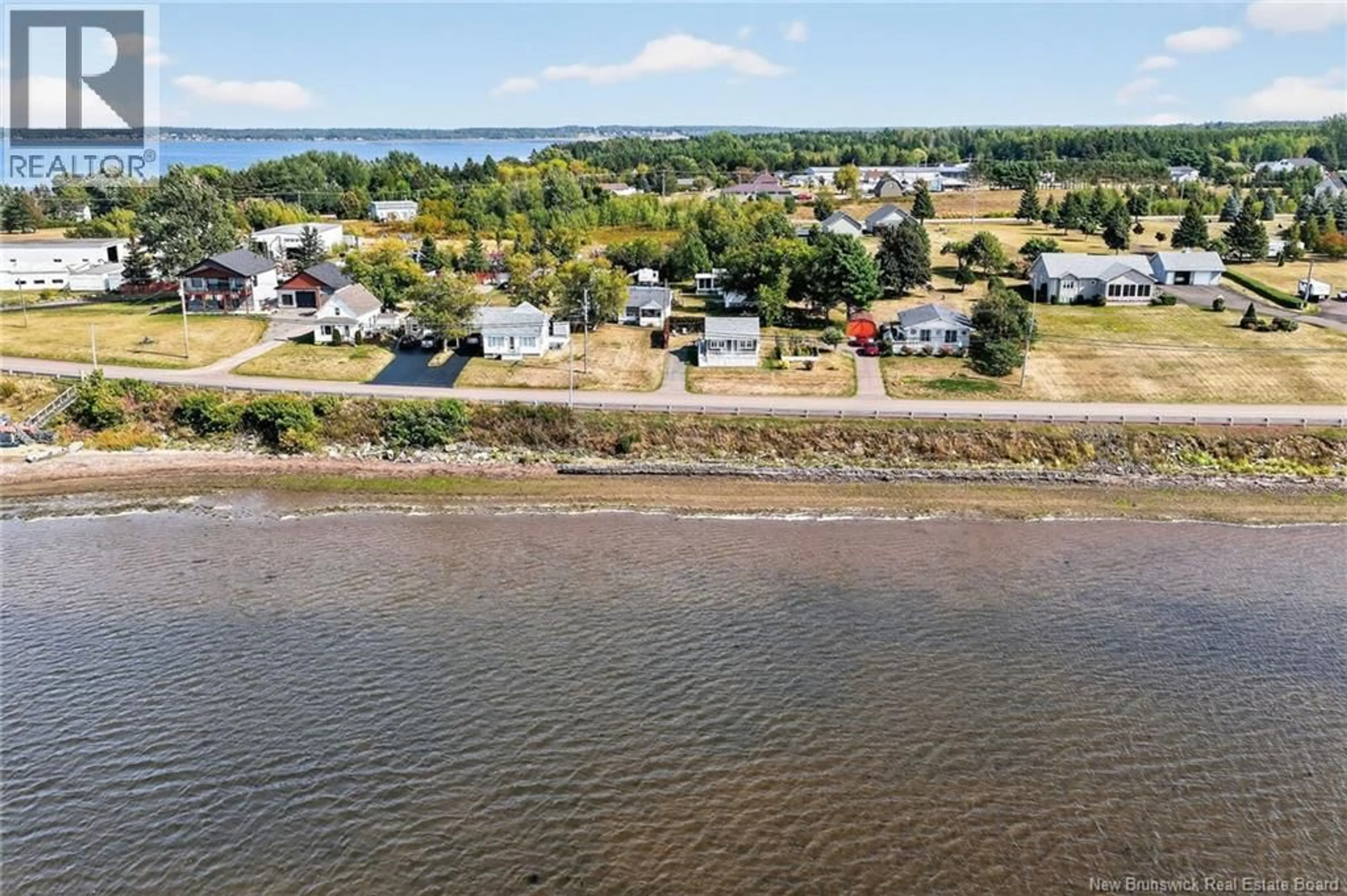 A pic from outside/outdoor area/front of a property/back of a property/a pic from drone, water/lake/river/ocean view for 61 COCAGNE SUD ROAD, Cocagne New Brunswick E4R2J7