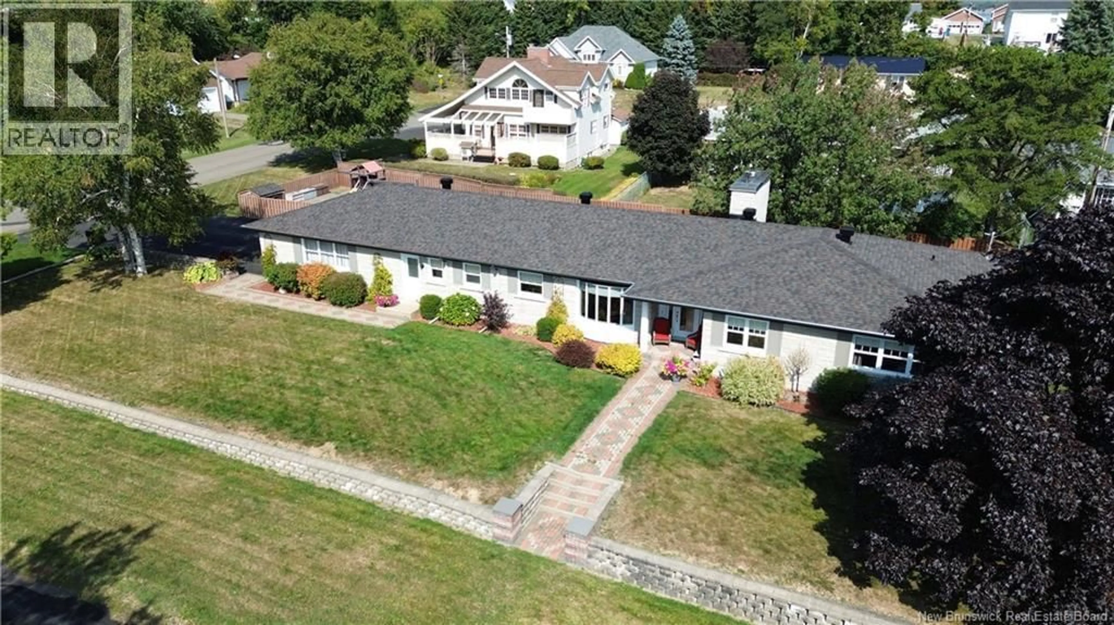 A pic from outside/outdoor area/front of a property/back of a property/a pic from drone, unknown for 249 VAUTOUR STREET, Dalhousie New Brunswick E8C2R3