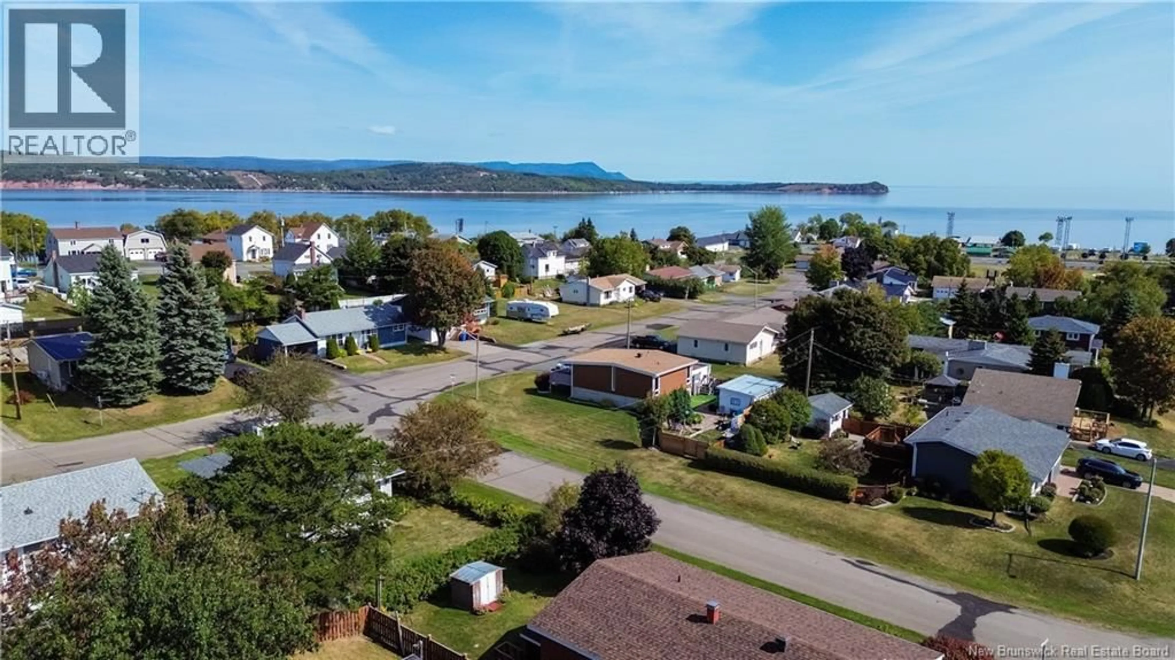 A pic from outside/outdoor area/front of a property/back of a property/a pic from drone, water/lake/river/ocean view for 249 VAUTOUR STREET, Dalhousie New Brunswick E8C2R3