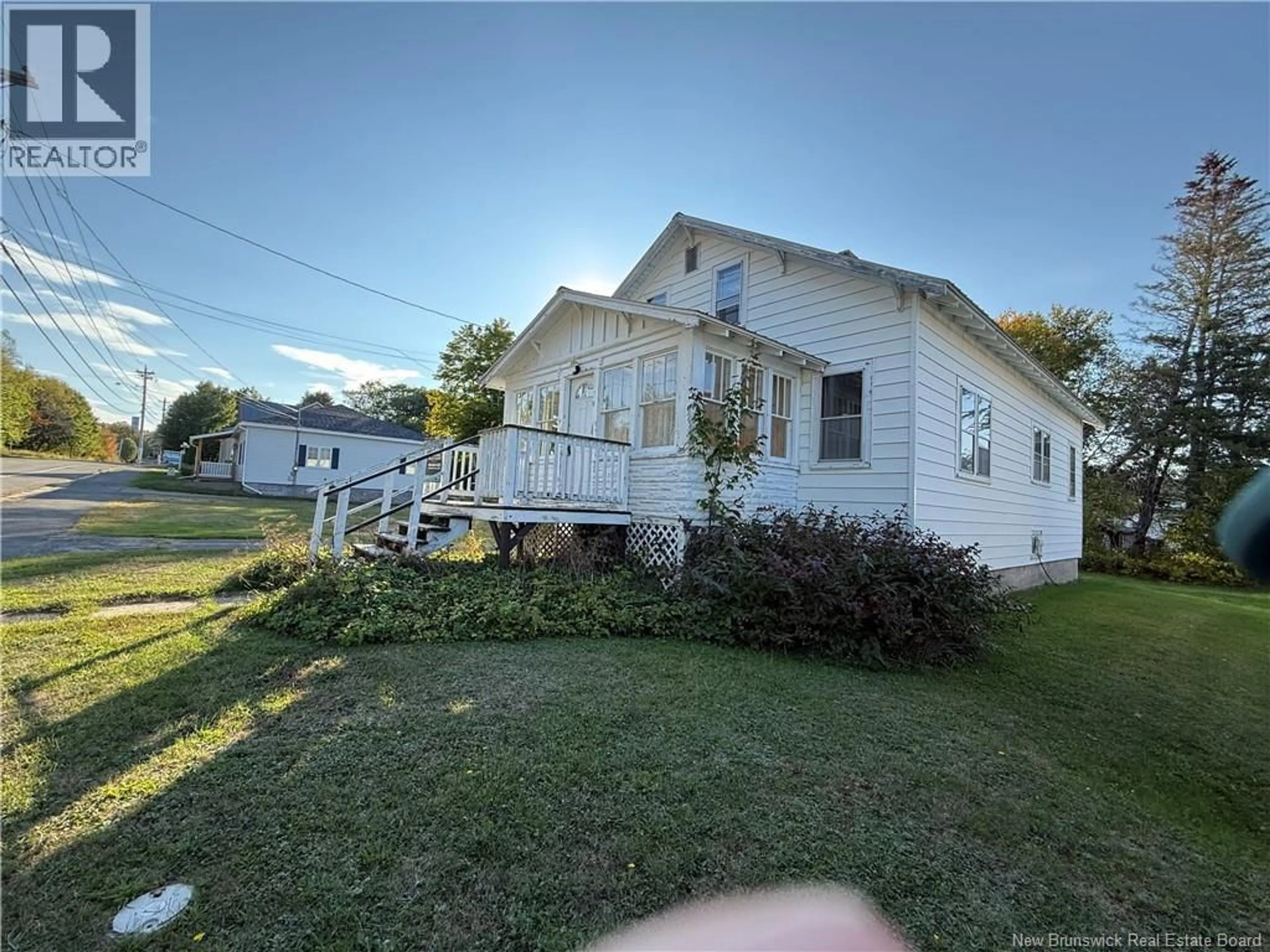 A pic from outside/outdoor area/front of a property/back of a property/a pic from drone, unknown for 67 SAUNDERS STREET, McAdam New Brunswick E6J1L4