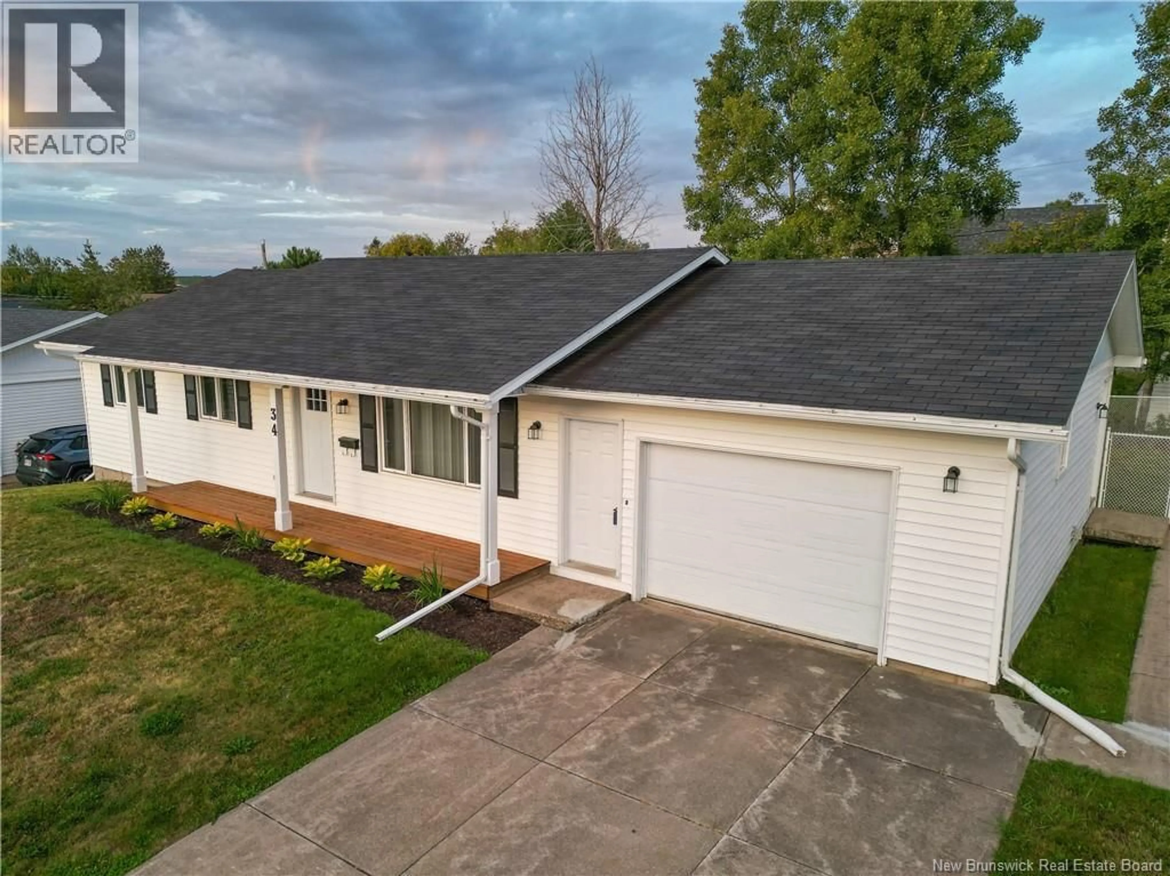 A pic from outside/outdoor area/front of a property/back of a property/a pic from drone, street for 34 MOLLINS CRESCENT, Moncton New Brunswick E1E4L6