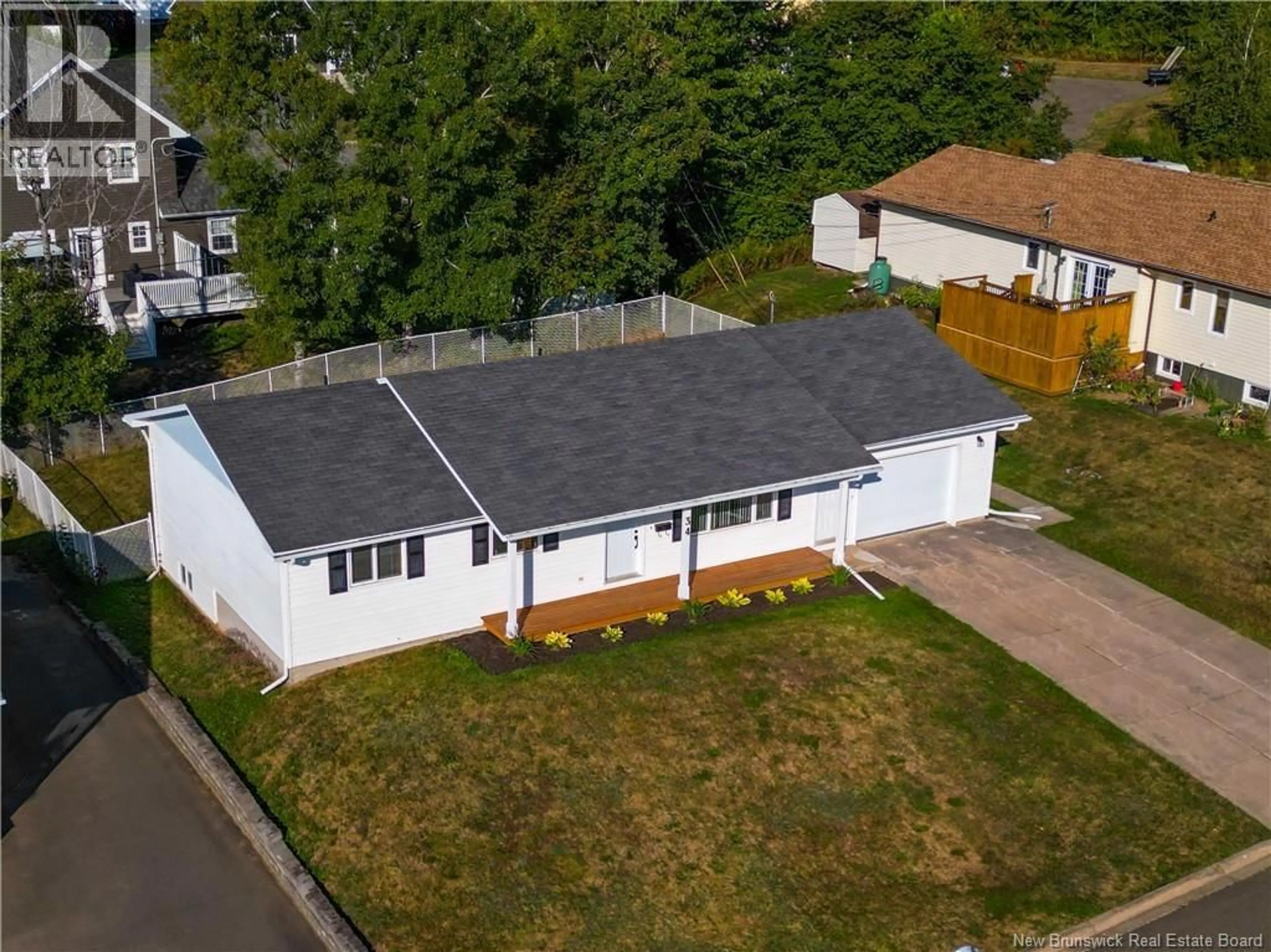 A pic from outside/outdoor area/front of a property/back of a property/a pic from drone, street for 34 MOLLINS CRESCENT, Moncton New Brunswick E1E4L6
