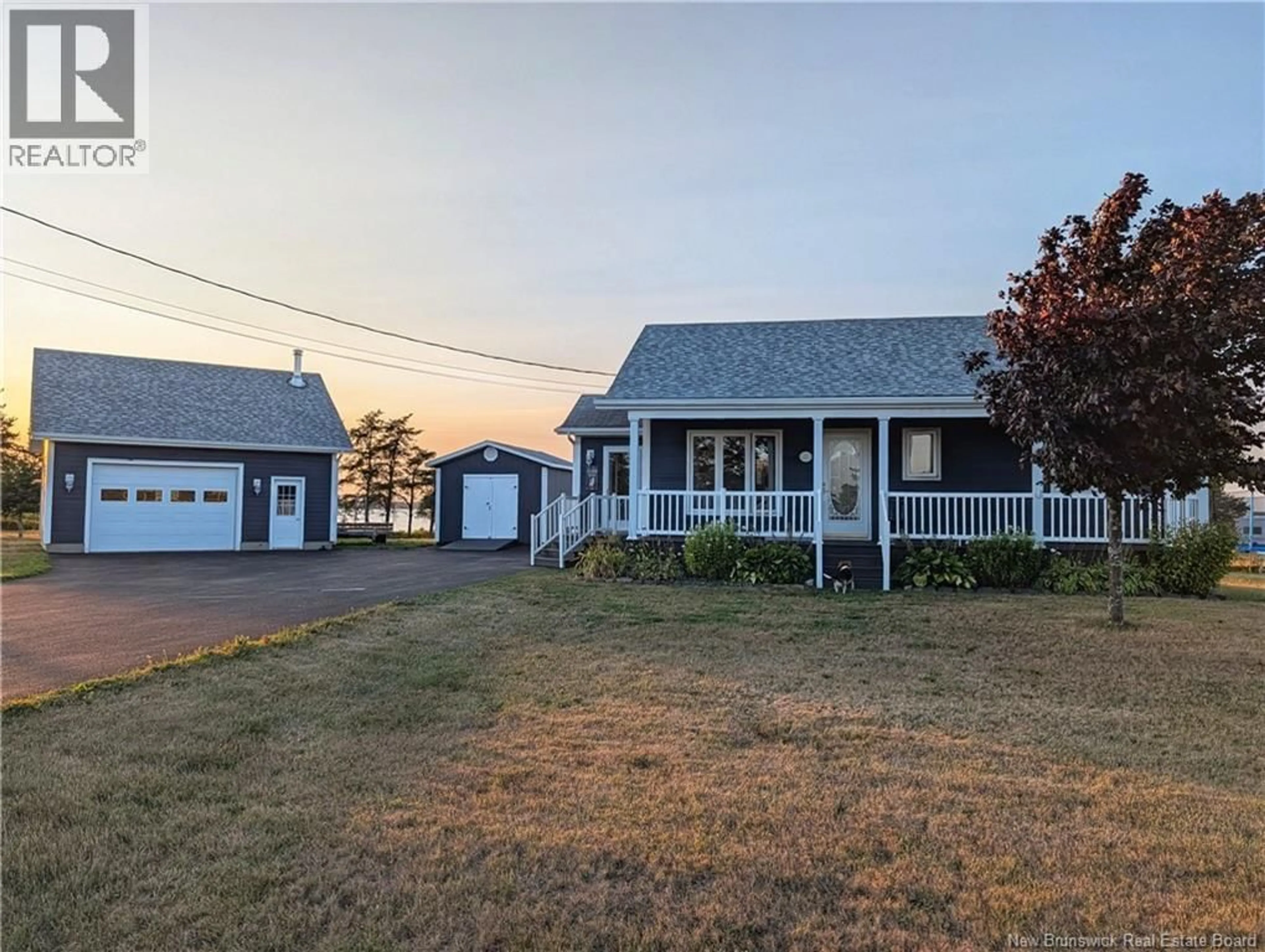 A pic from outside/outdoor area/front of a property/back of a property/a pic from drone, street for 11 RUE DU MOULIN, Inkerman New Brunswick E8P1A7