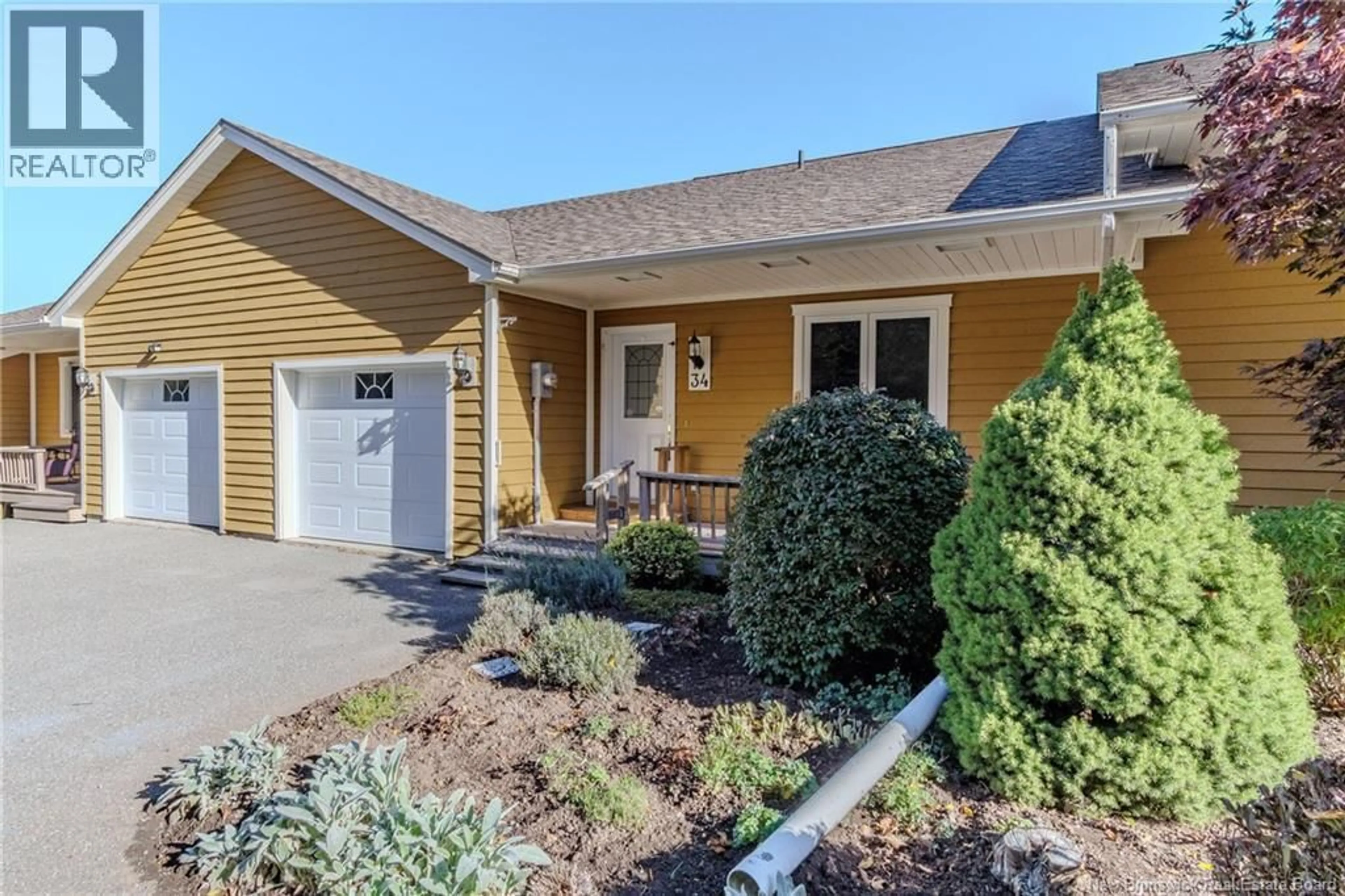 Home with vinyl exterior material, street for 34 MERRITT HILL ROAD, Quispamsis New Brunswick E2E6A1
