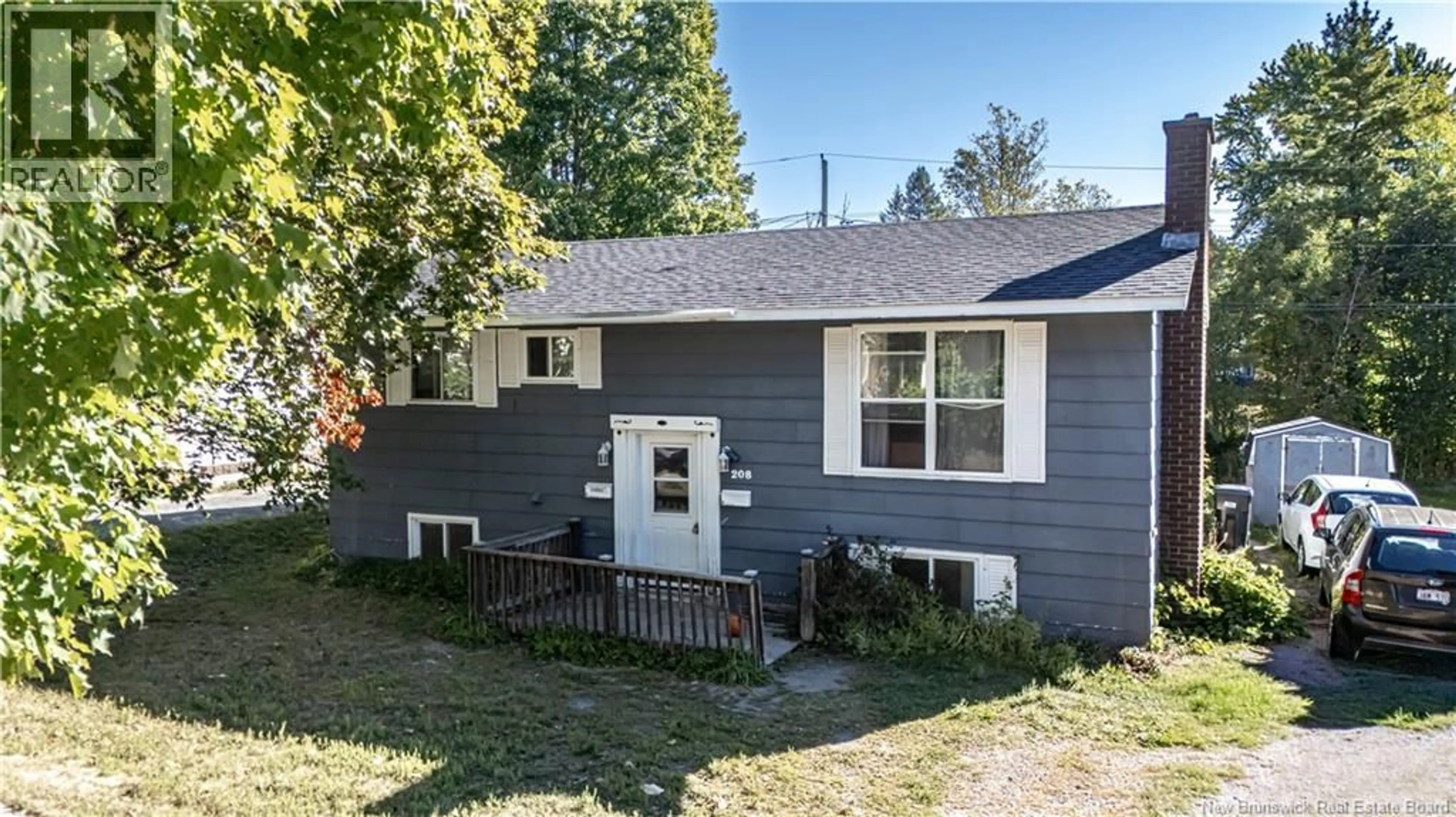 Home with vinyl exterior material, street for 208 MCKEEN STREET, Fredericton New Brunswick E3A2R1
