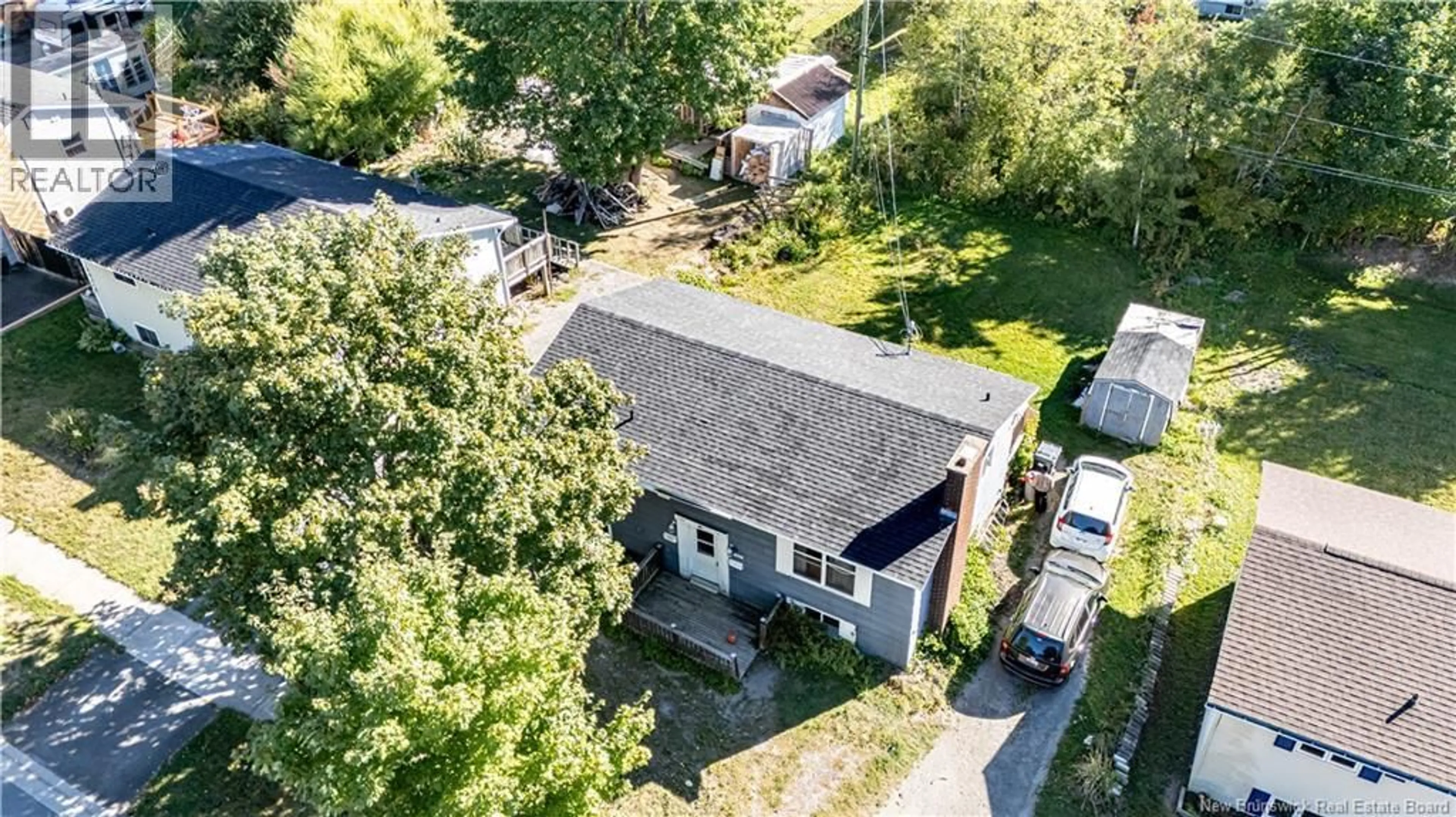A pic from outside/outdoor area/front of a property/back of a property/a pic from drone, street for 208 MCKEEN STREET, Fredericton New Brunswick E3A2R1