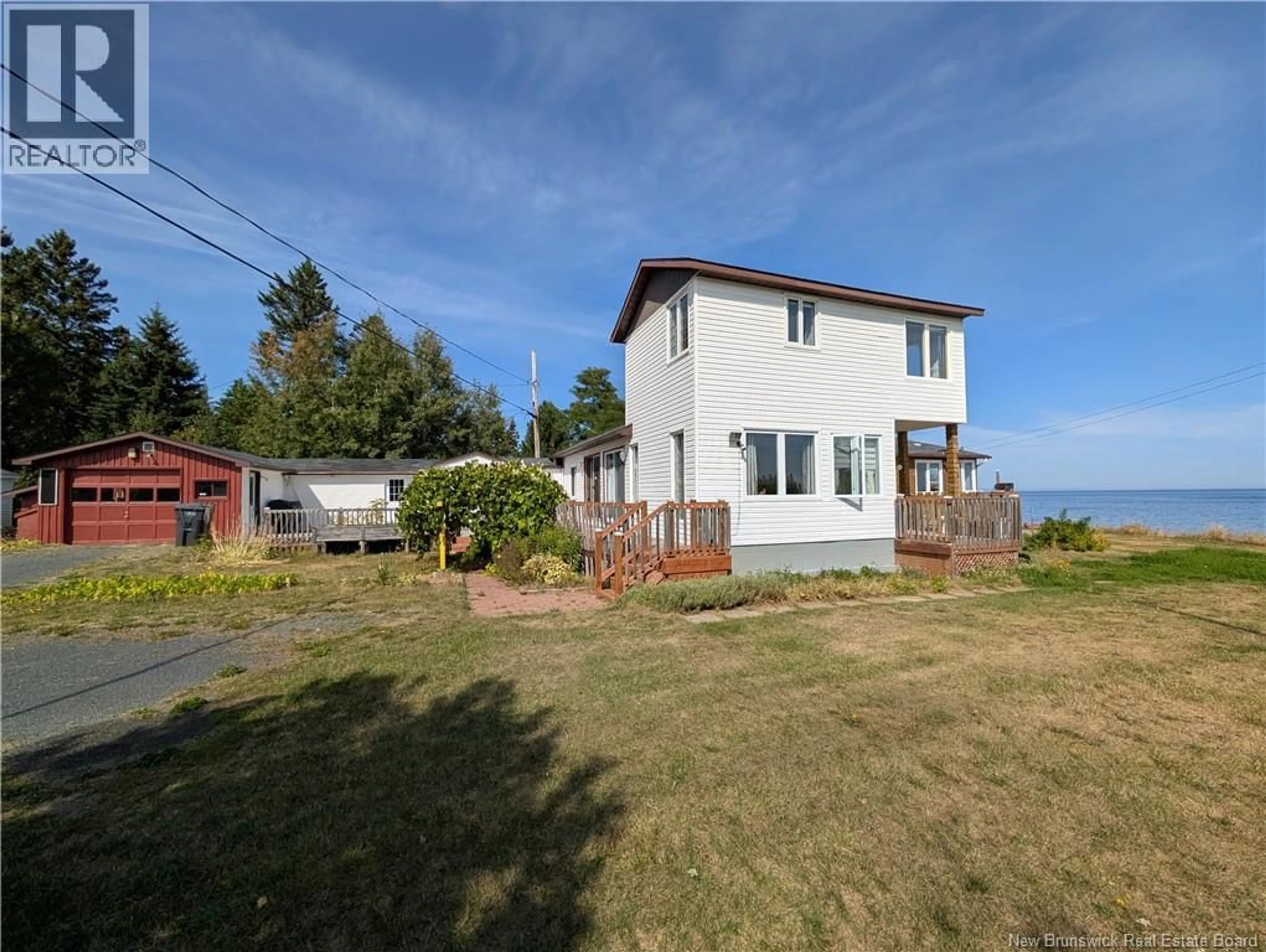 A pic from outside/outdoor area/front of a property/back of a property/a pic from drone, water/lake/river/ocean view for 101 DEGRÂCE, Nigadoo New Brunswick E8K3R7
