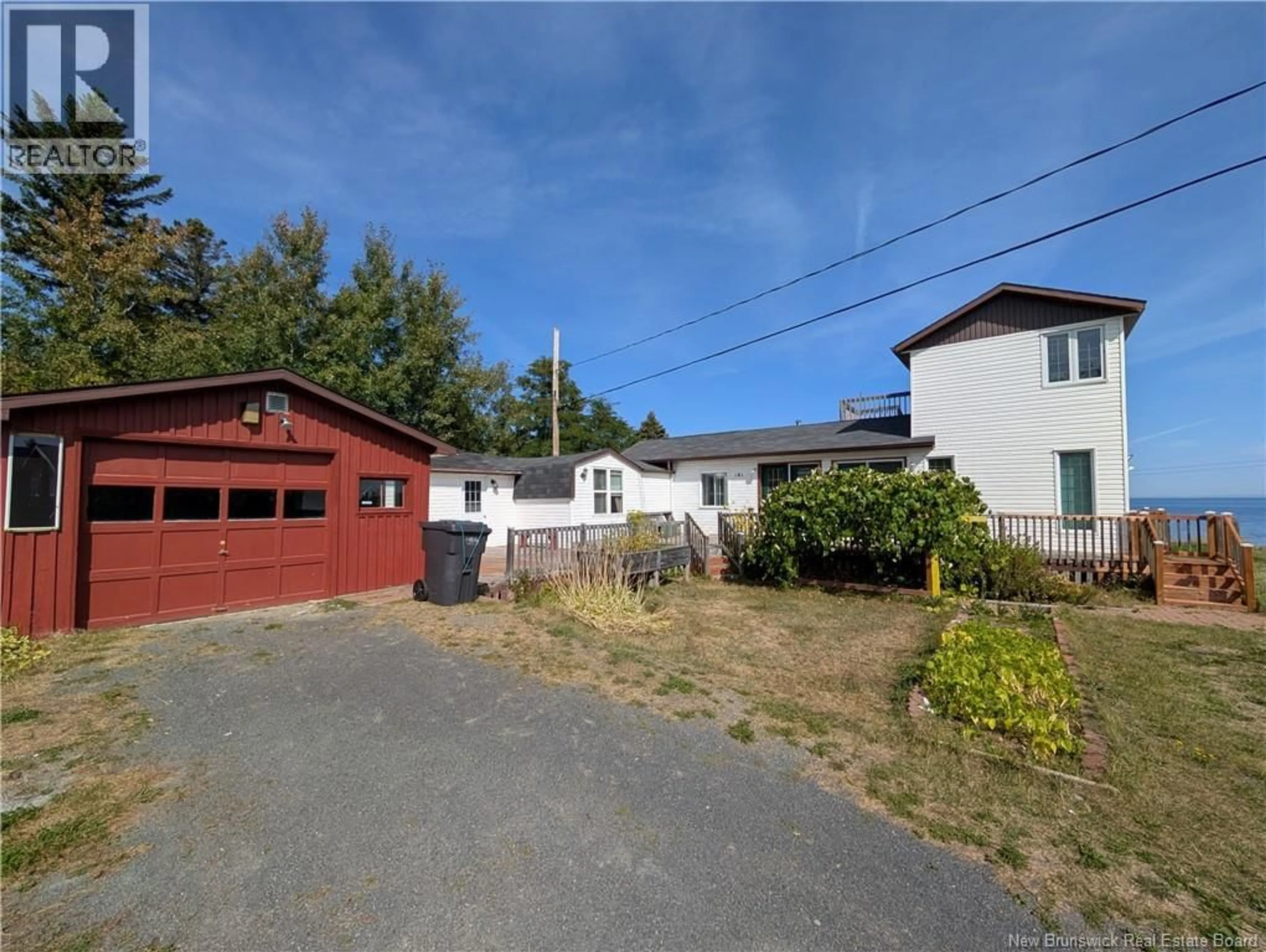 A pic from outside/outdoor area/front of a property/back of a property/a pic from drone, street for 101 DEGRÂCE, Nigadoo New Brunswick E8K3R7