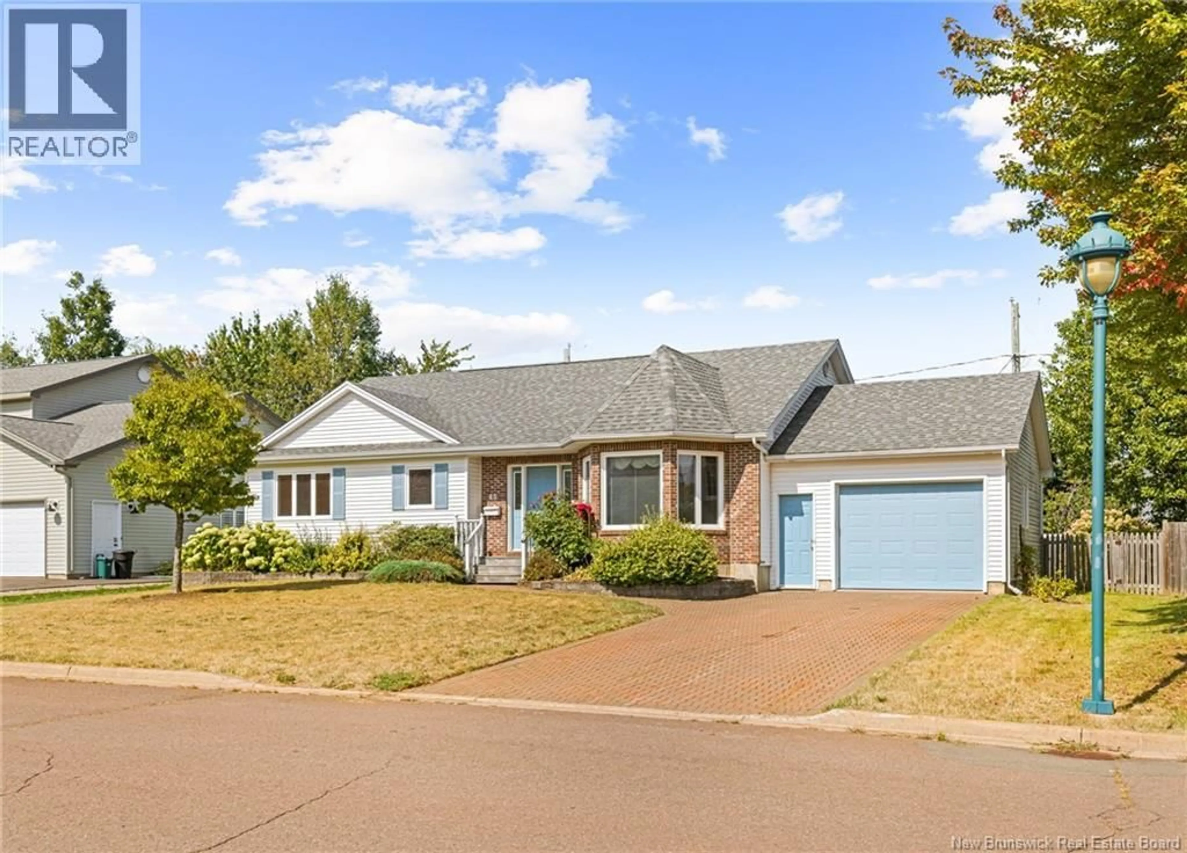 Home with brick exterior material, street for 45 FOXWOOD DRIVE, Moncton New Brunswick E1G3S6