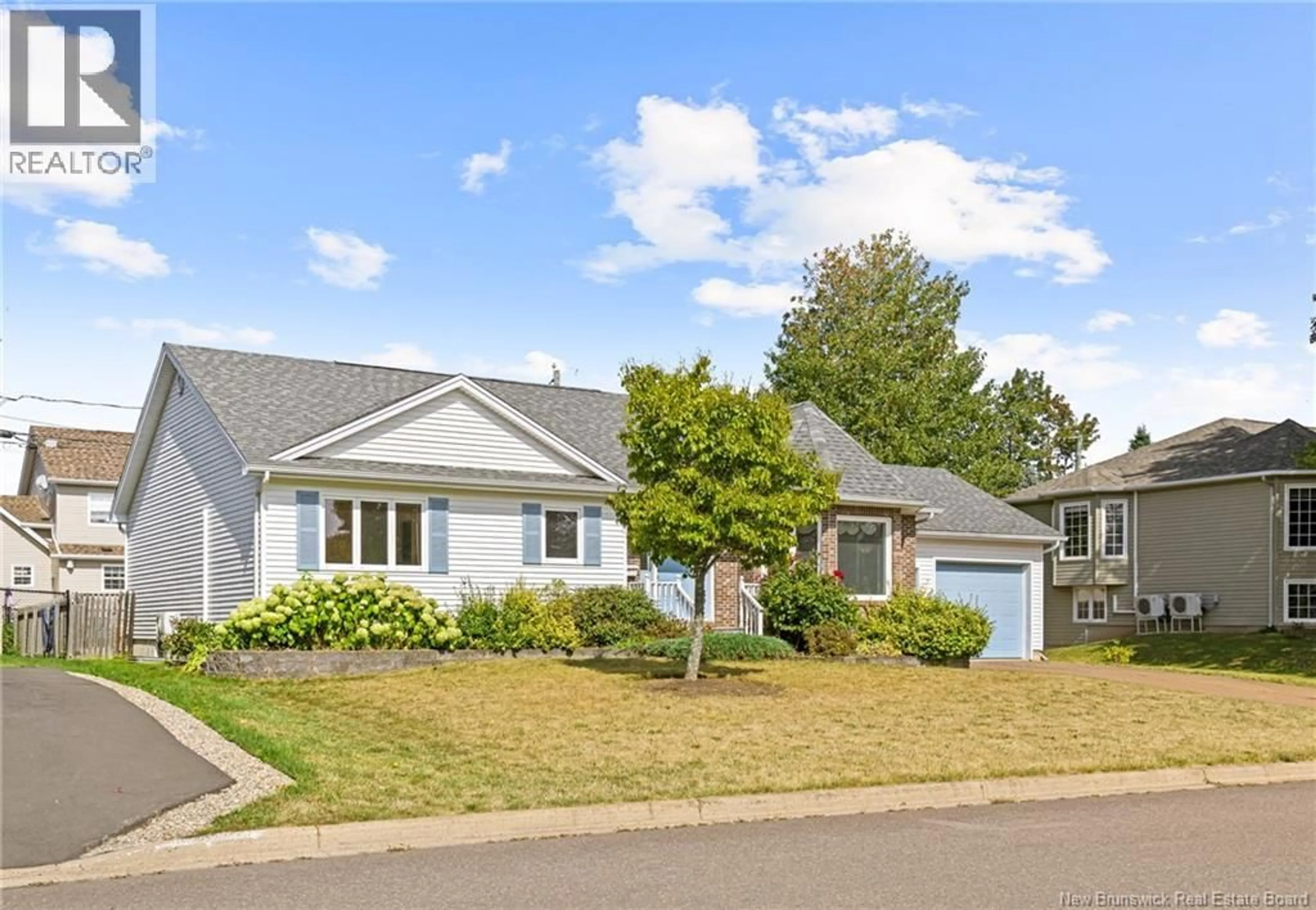 Home with vinyl exterior material, street for 45 FOXWOOD DRIVE, Moncton New Brunswick E1G3S6