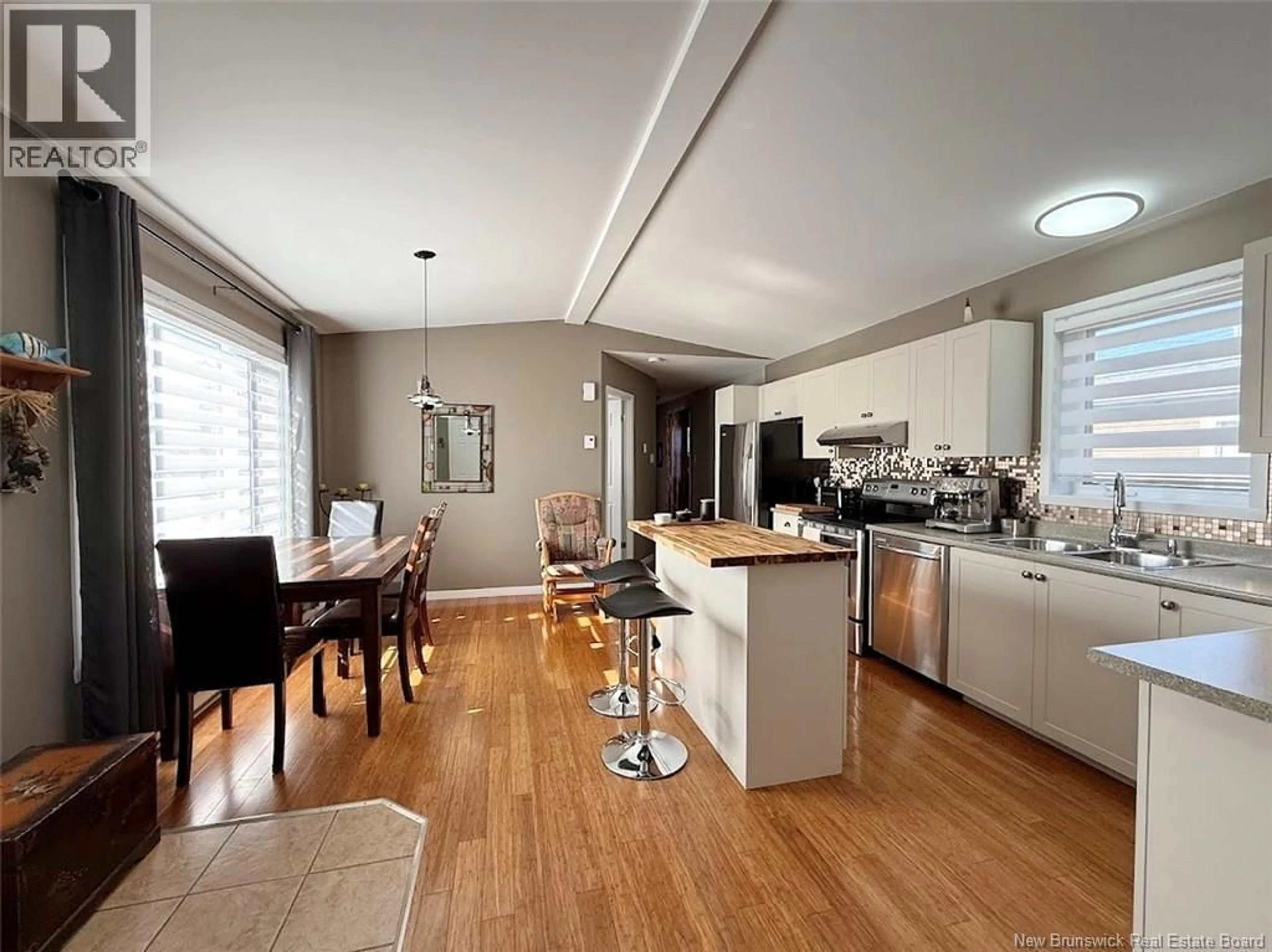 Open concept kitchen, wood/laminate floor for 4 LAVALLÉE STREET, Saint-Jacques New Brunswick E7B1T3