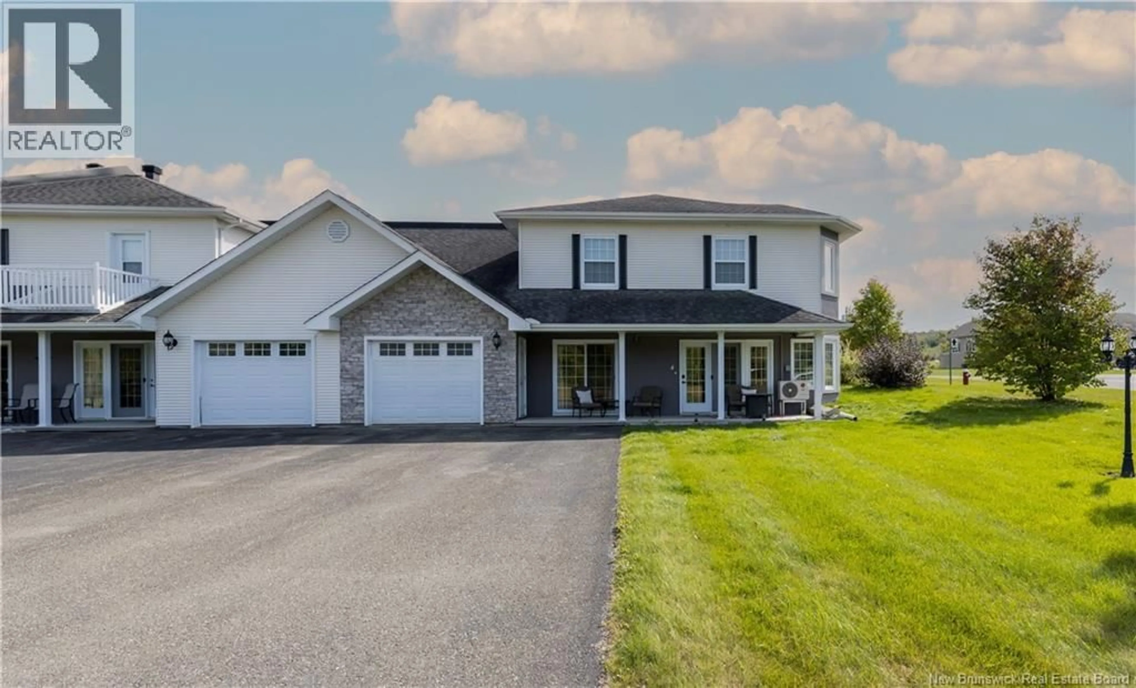 Home with vinyl exterior material, street for 4 - 31 HARRISON STREET, Grand-Sault/Grand Falls New Brunswick E3Z0B3