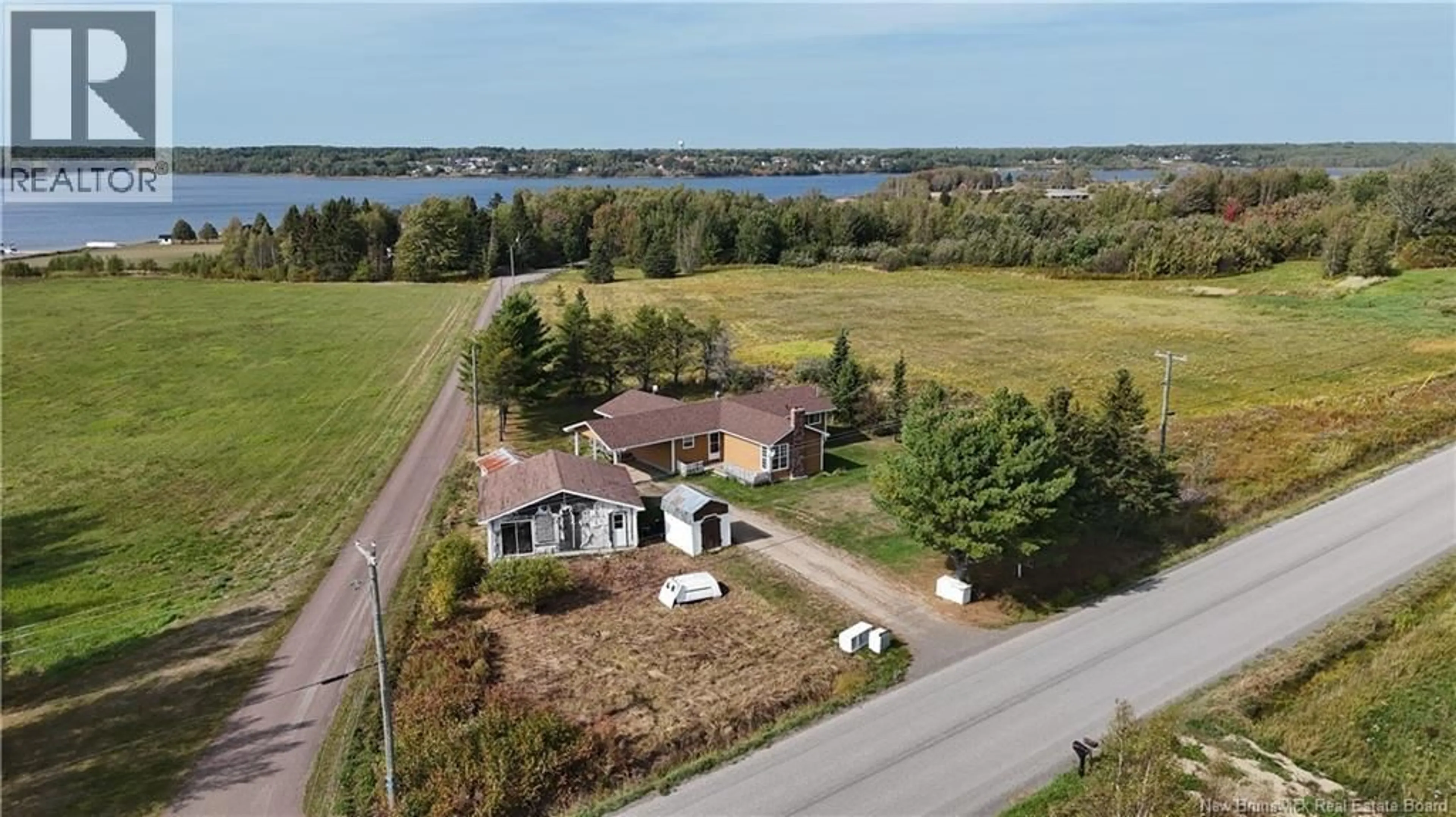 A pic from outside/outdoor area/front of a property/back of a property/a pic from drone, water/lake/river/ocean view for 1150 ROUTE 510, Main River New Brunswick E4T1T9