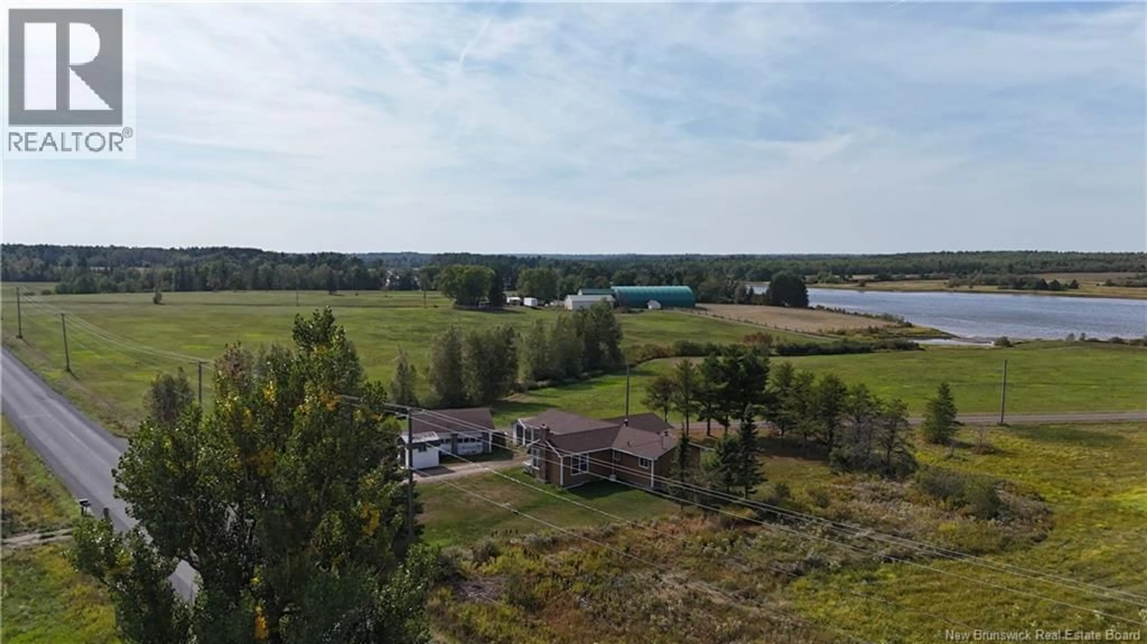 A pic from outside/outdoor area/front of a property/back of a property/a pic from drone, water/lake/river/ocean view for 1150 ROUTE 510, Main River New Brunswick E4T1T9