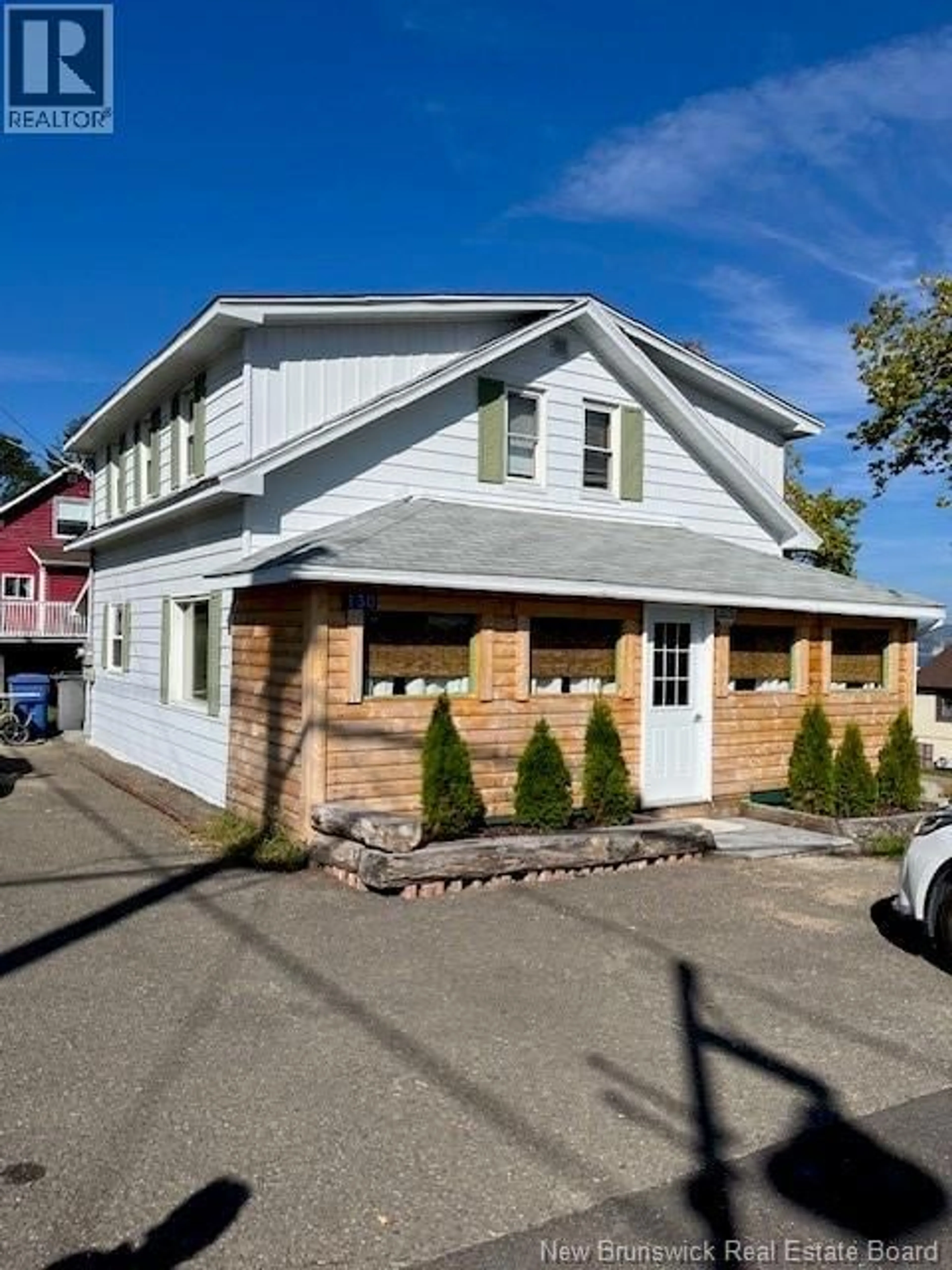 Home with vinyl exterior material, street for 130 BRUNSWICK STREET, Dalhousie New Brunswick E8C1G6