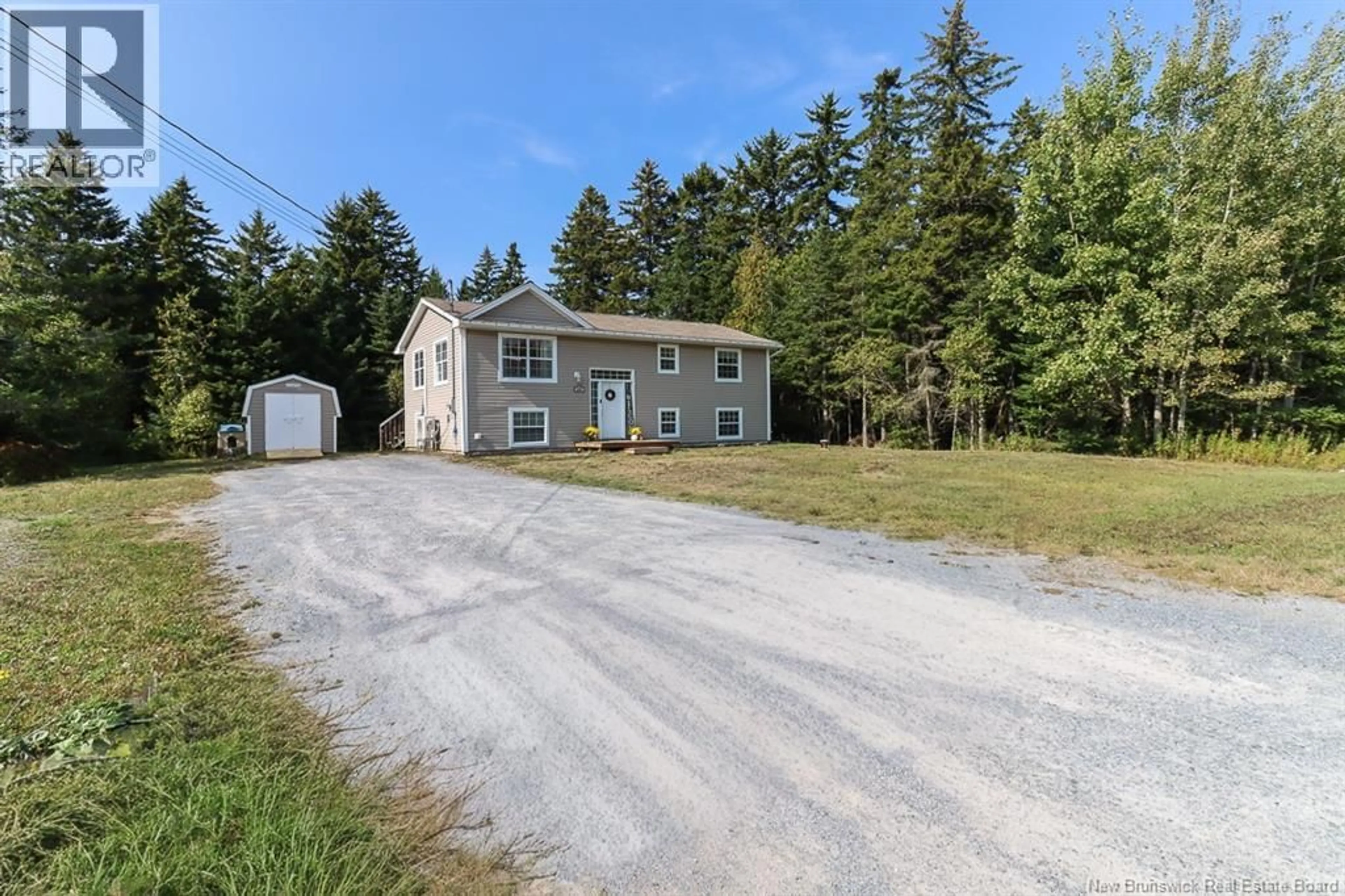 A pic from outside/outdoor area/front of a property/back of a property/a pic from drone, street for 227 VINCENT ROAD, Quispamsis New Brunswick E2E0B3