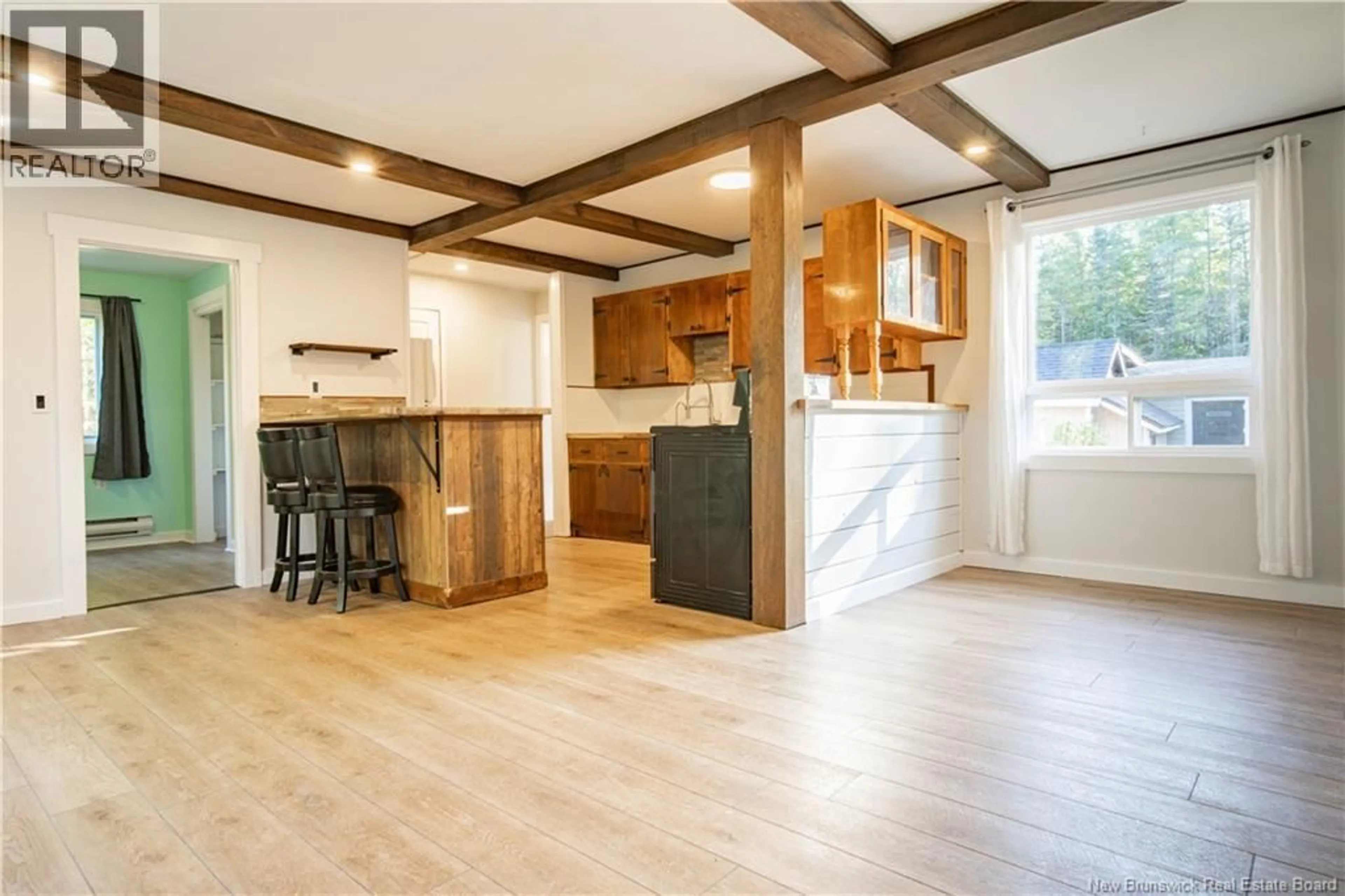 Open concept kitchen, wood/laminate floor for 12 GRUB ROAD, Colpitts Settlement New Brunswick E4J1E1