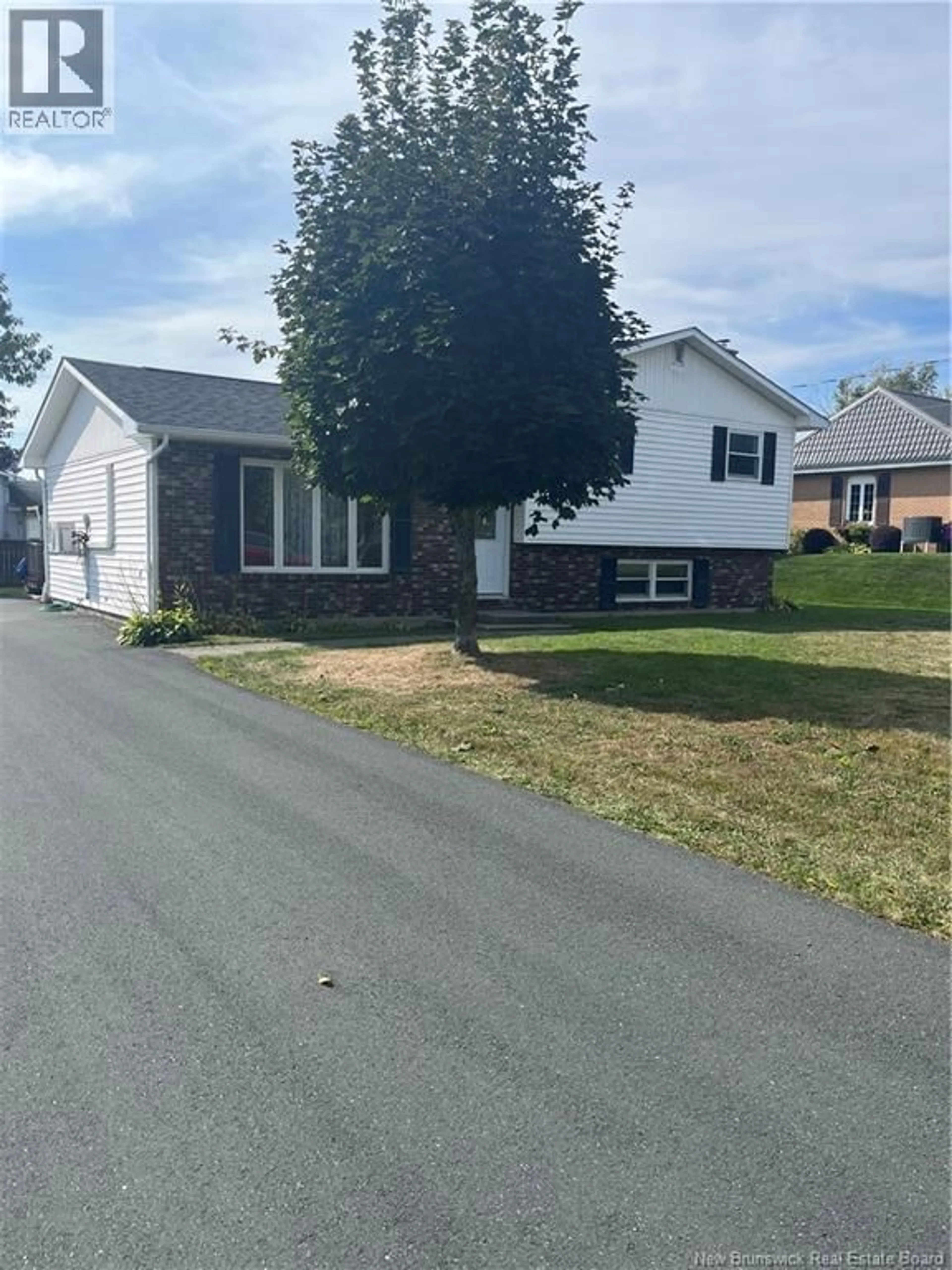 Home with vinyl exterior material, street for 17 ADAMS AVENUE, Miramichi New Brunswick E1V3Y6