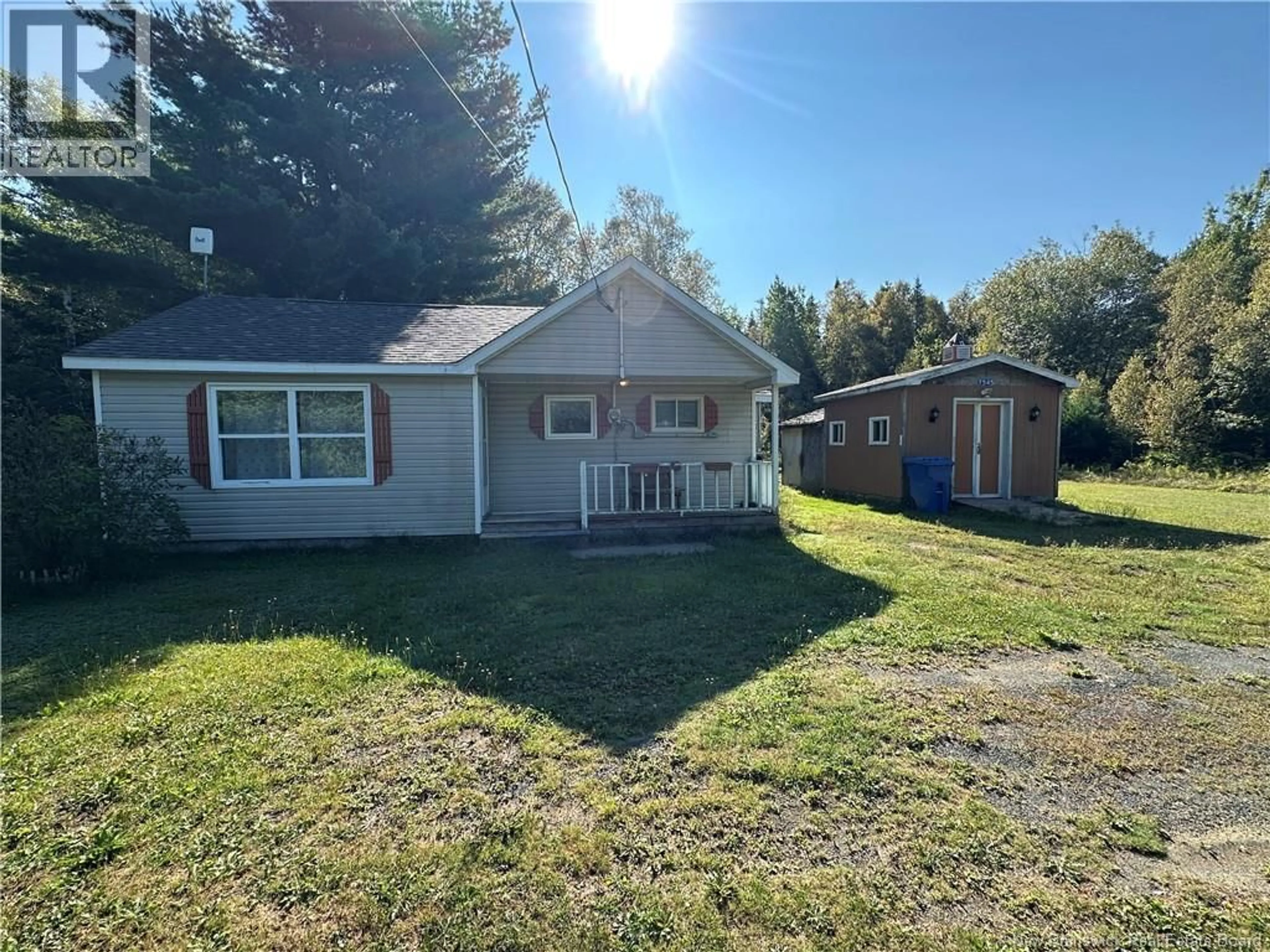A pic from outside/outdoor area/front of a property/back of a property/a pic from drone, street for 7545 RTE 117 HWY, Black River Bridge New Brunswick E1N5L9