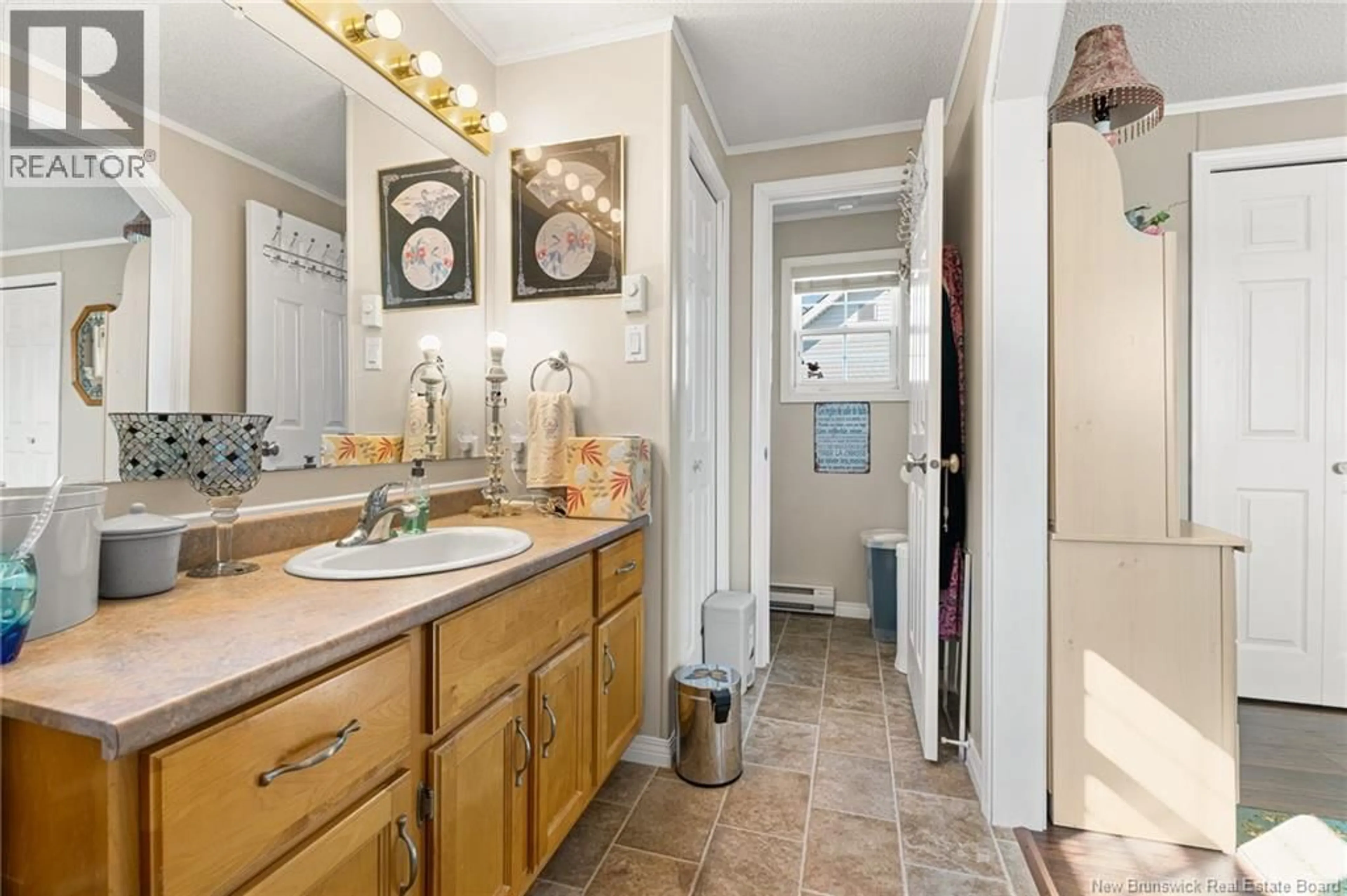 Standard bathroom, ceramic/tile floor for 11 ASCONA STREET, Moncton New Brunswick E1H3H7