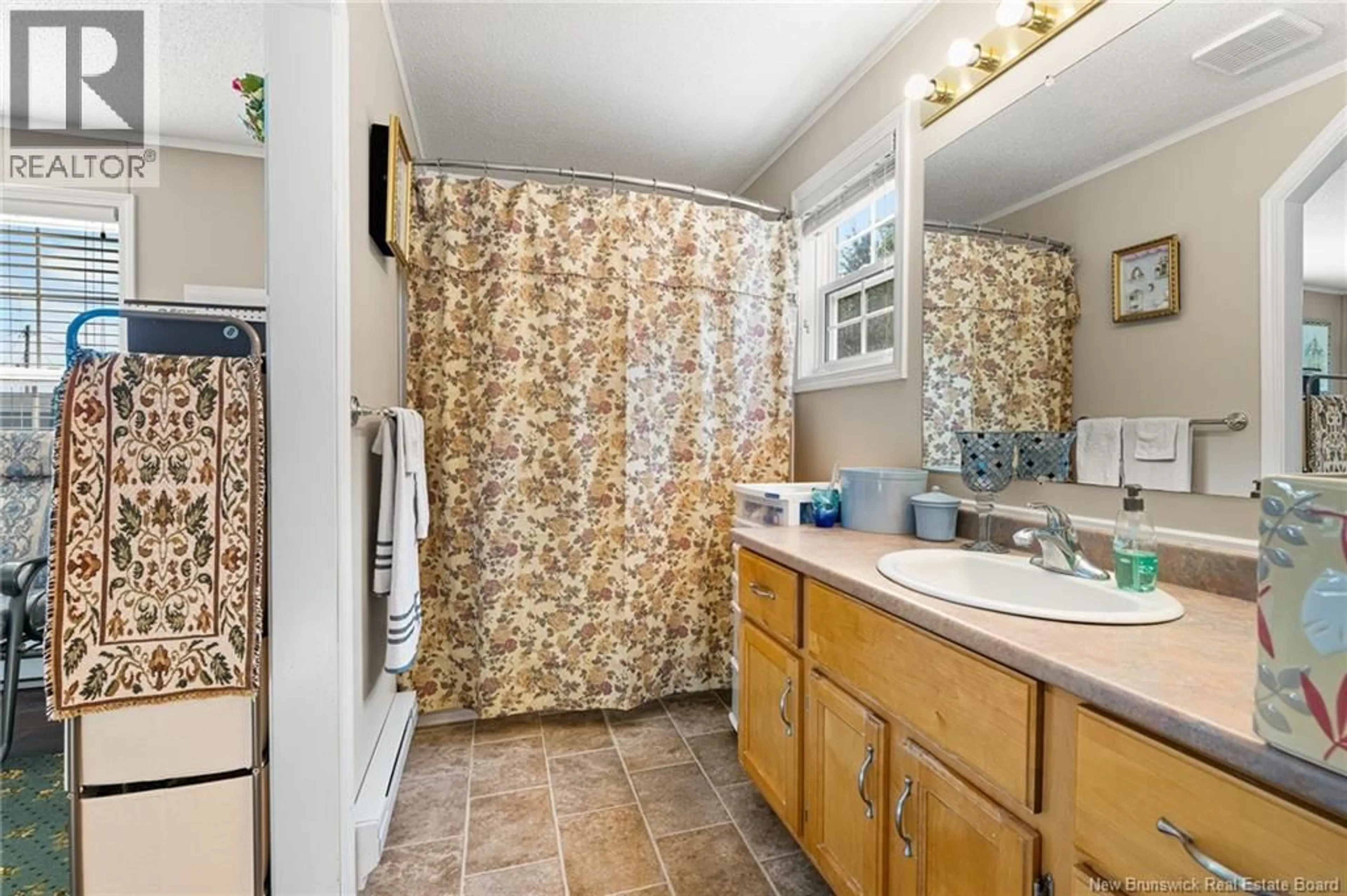 Standard bathroom, ceramic/tile floor for 11 ASCONA STREET, Moncton New Brunswick E1H3H7