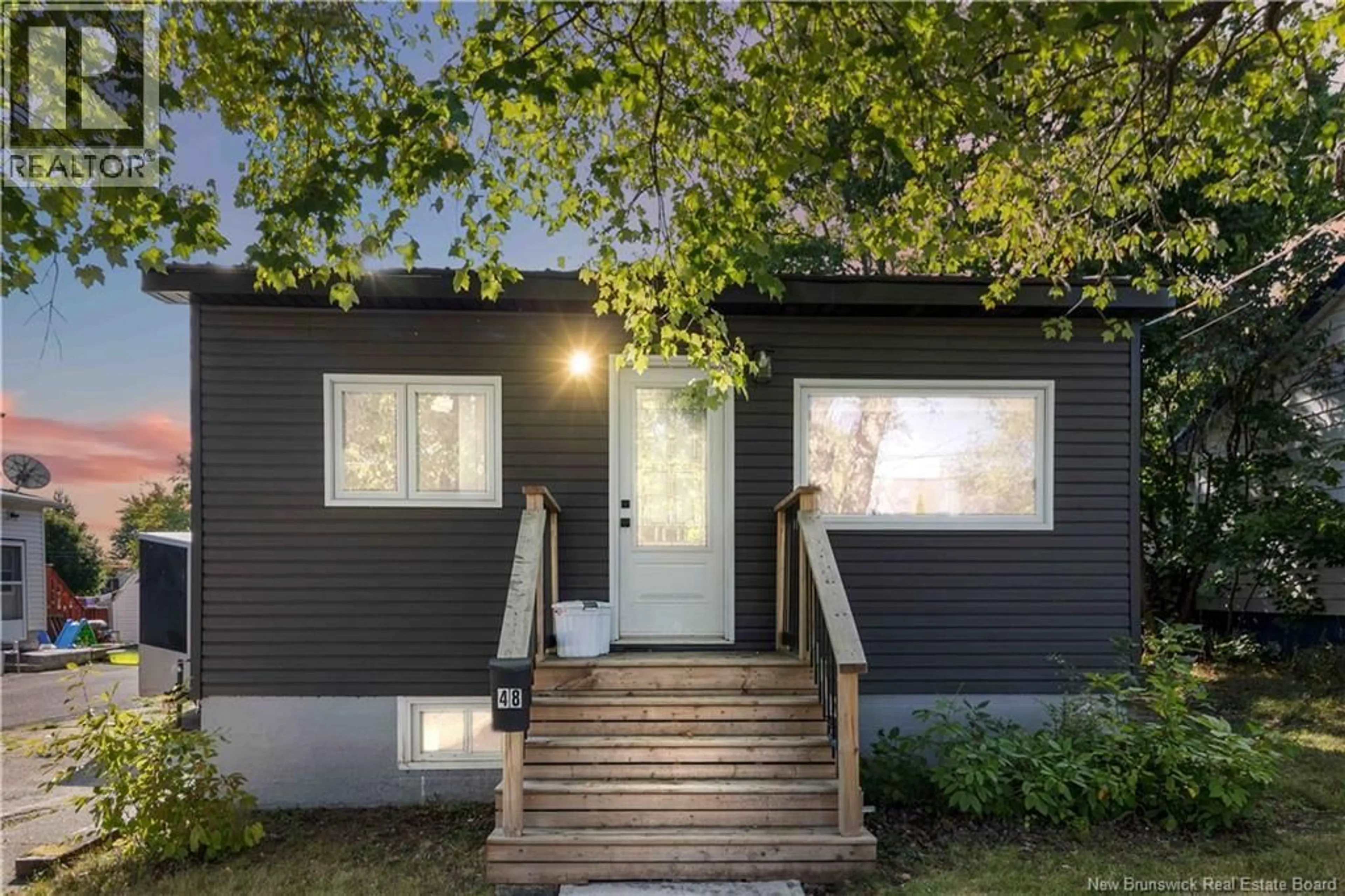 Home with vinyl exterior material, street for 48 EIGHTH STREET, Moncton New Brunswick E1E3E9
