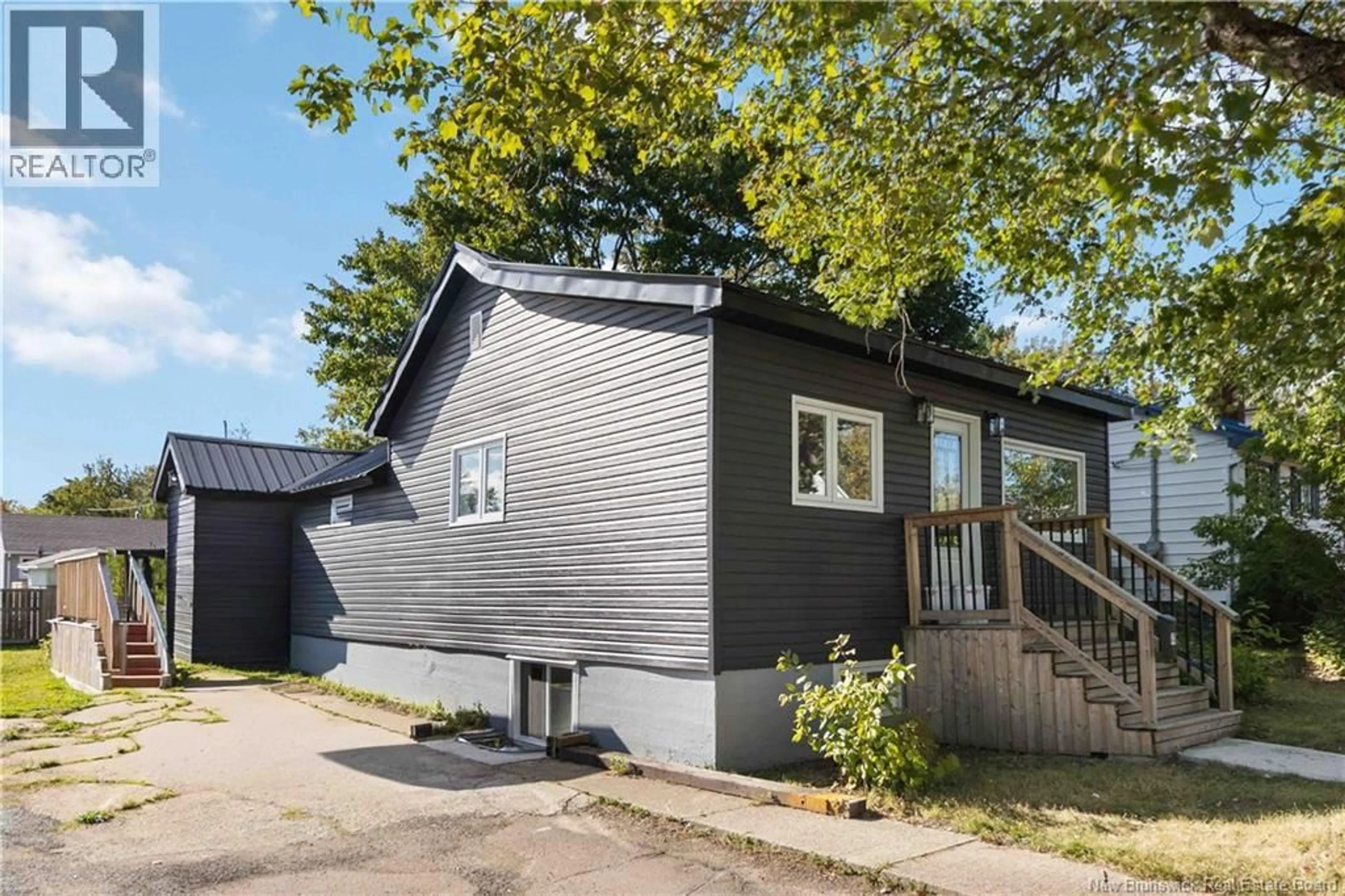 Home with vinyl exterior material, street for 48 EIGHTH STREET, Moncton New Brunswick E1E3E9