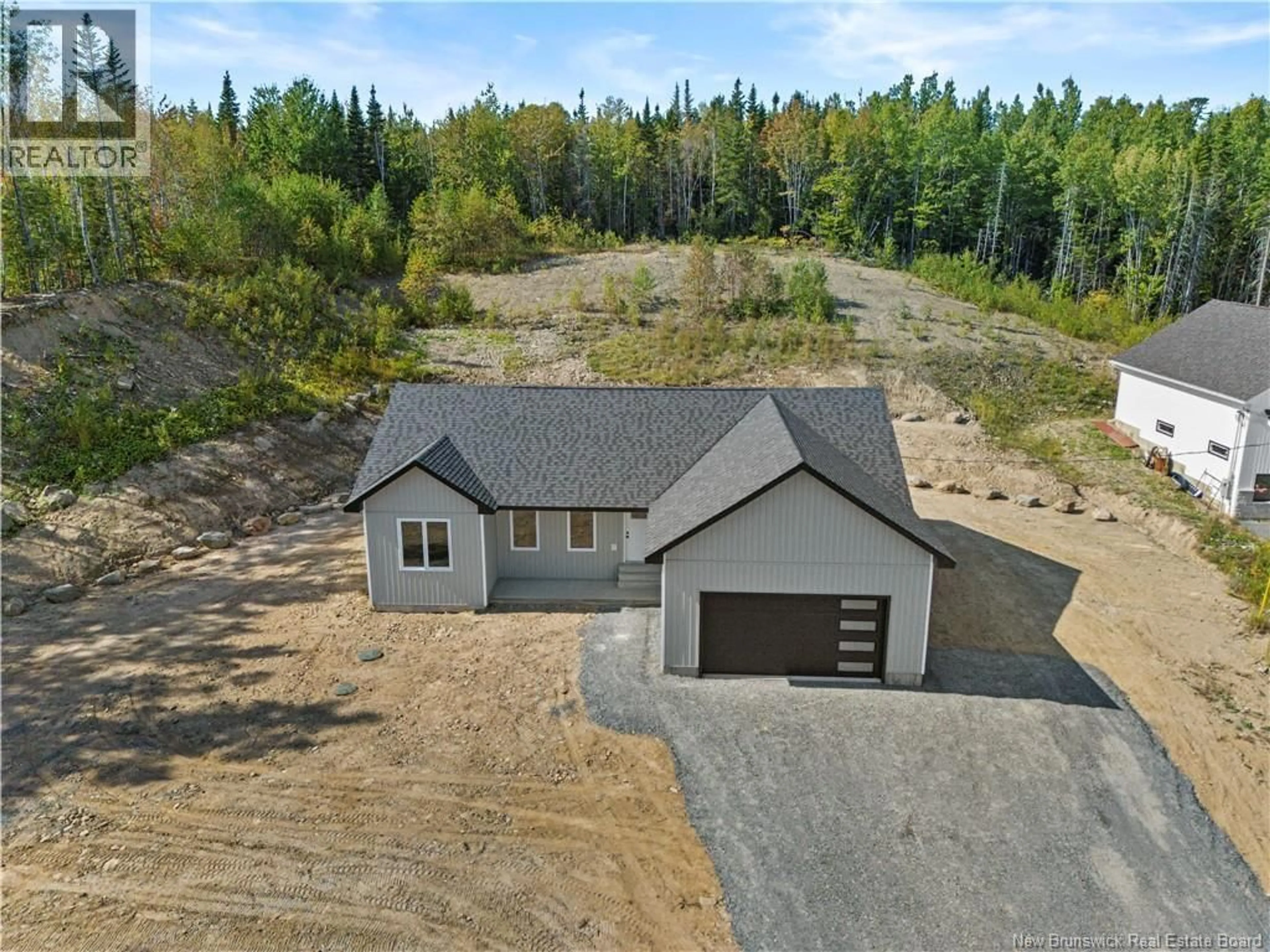 A pic from outside/outdoor area/front of a property/back of a property/a pic from drone, unknown for 141 LEELAND WAY, Killarney Road New Brunswick E3A5M7