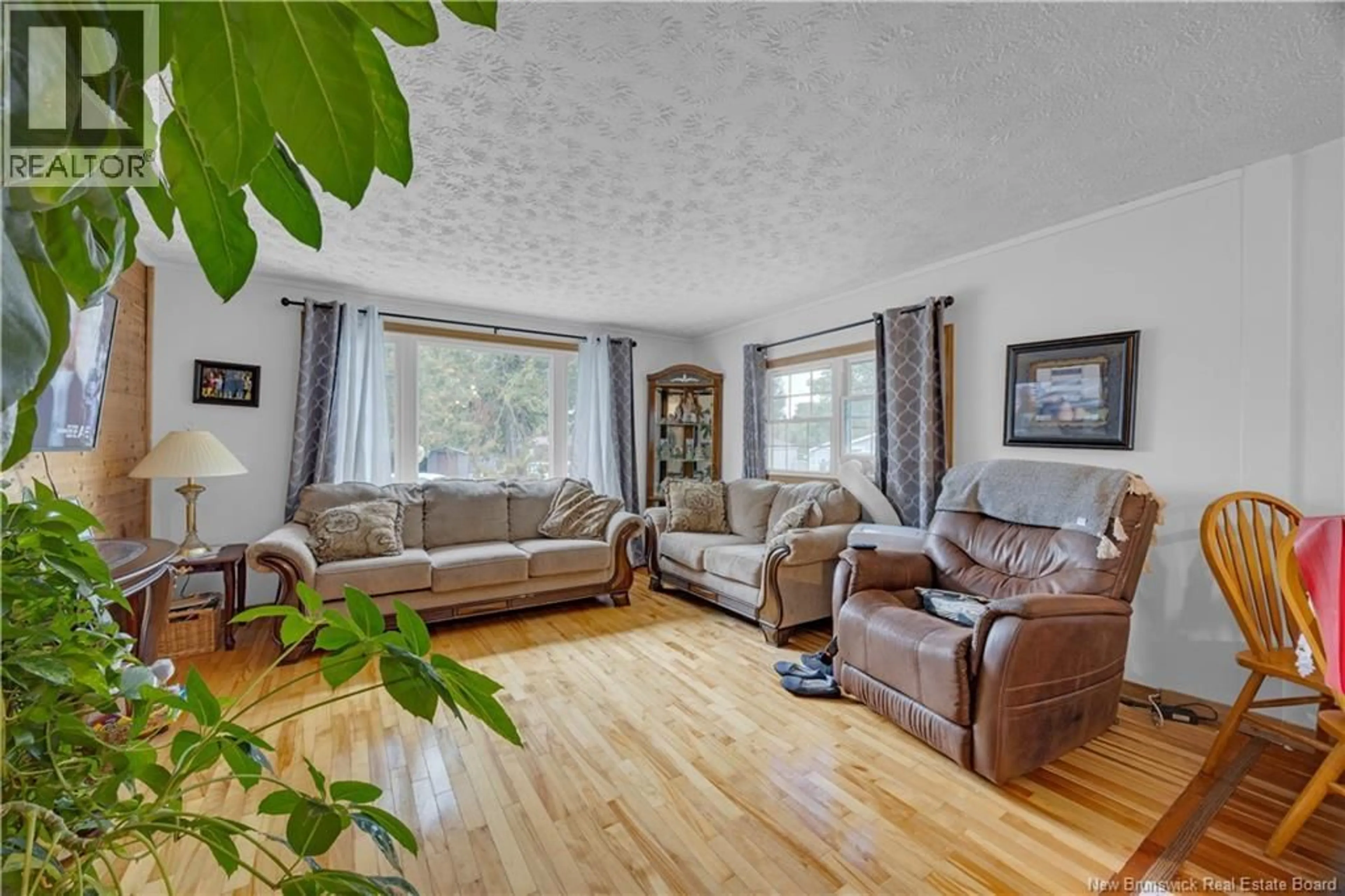 Living room with furniture, unknown for 43 WALNUT LANE, Quispamsis New Brunswick E2G1X2