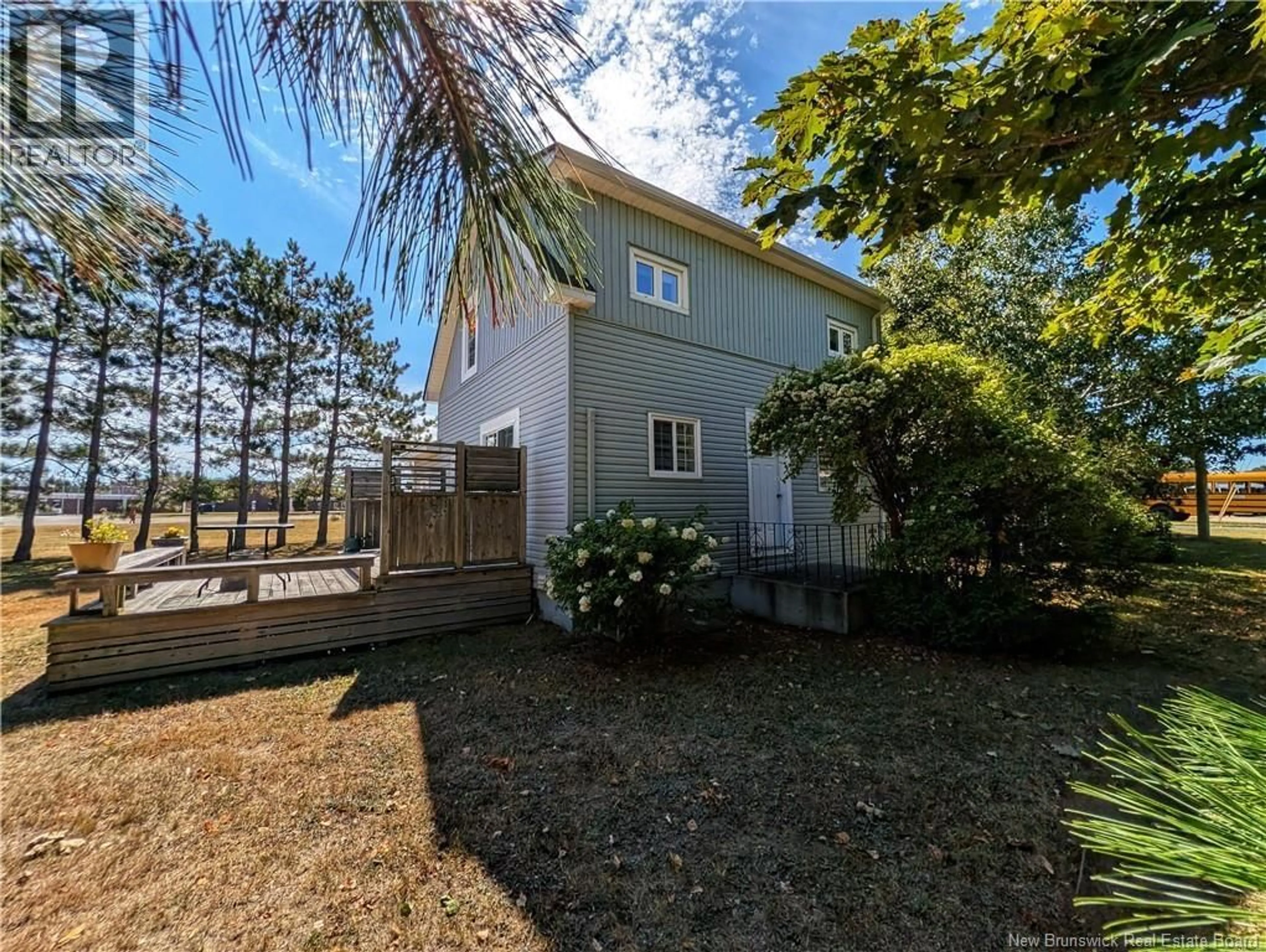 Home with vinyl exterior material, street for 3 RUE DES ÉRABLES, Caraquet New Brunswick E1W1A5
