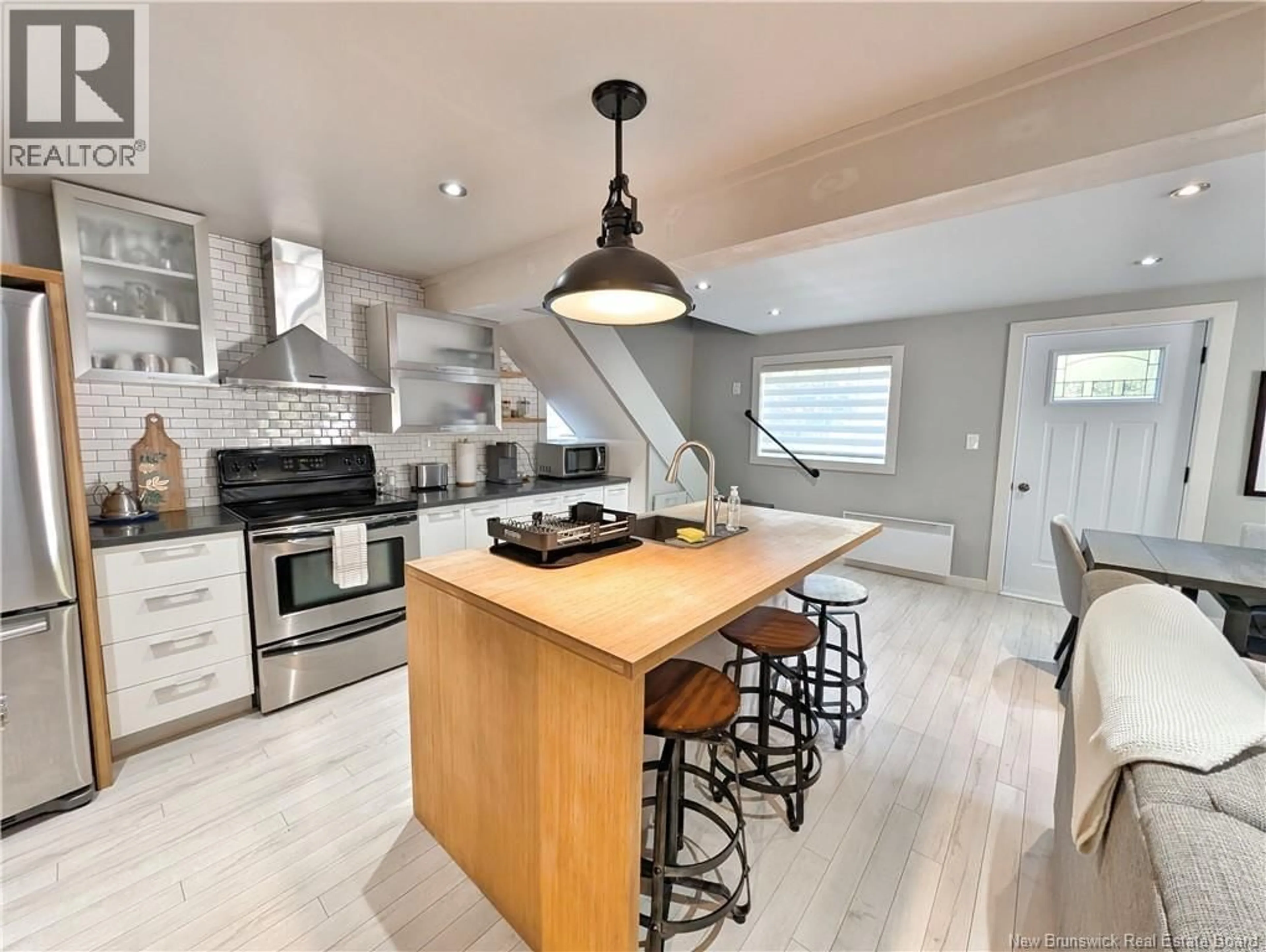 Open concept kitchen, unknown for 3 RUE DES ÉRABLES, Caraquet New Brunswick E1W1A5