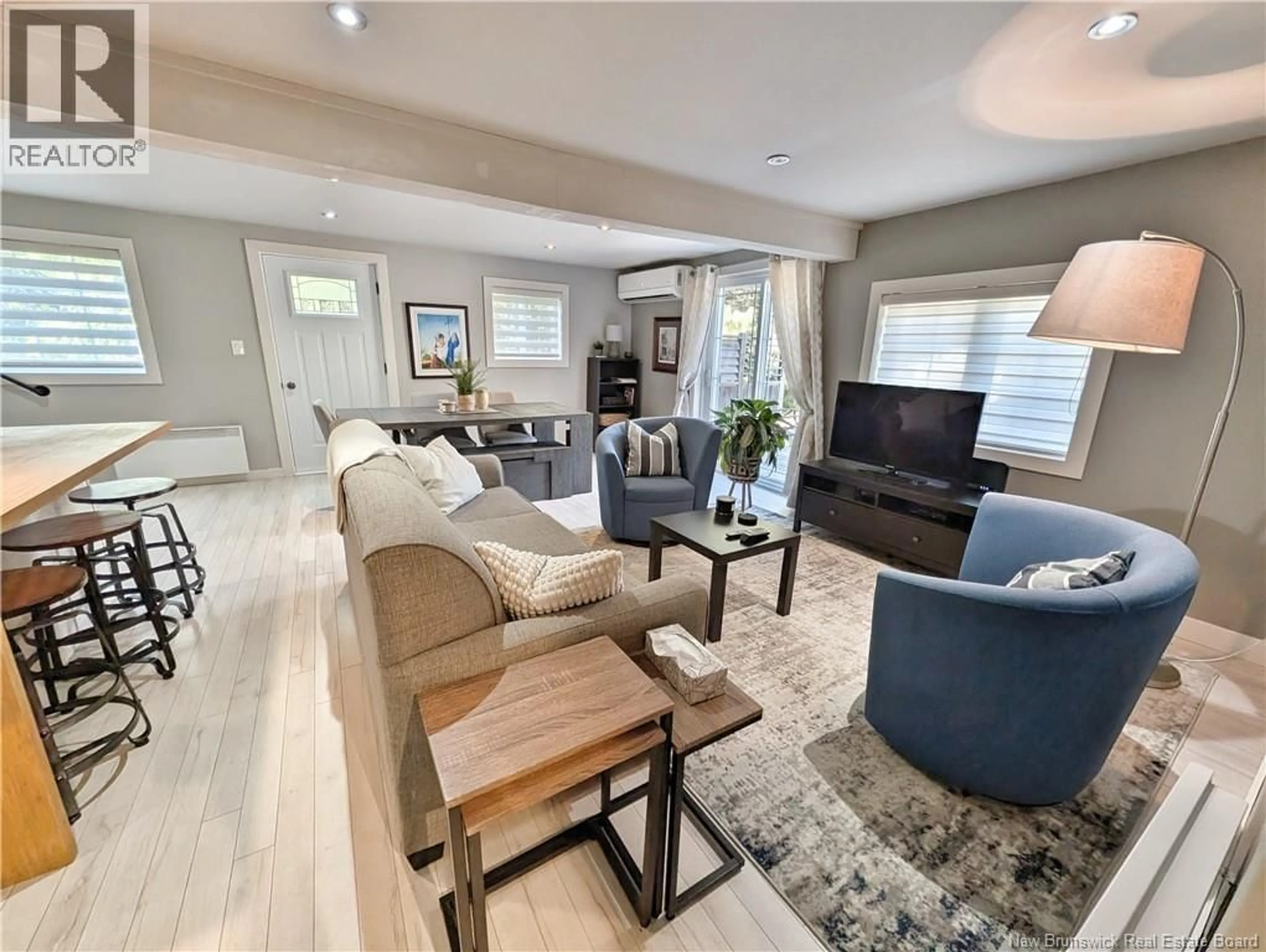 Living room with furniture, unknown for 3 RUE DES ÉRABLES, Caraquet New Brunswick E1W1A5