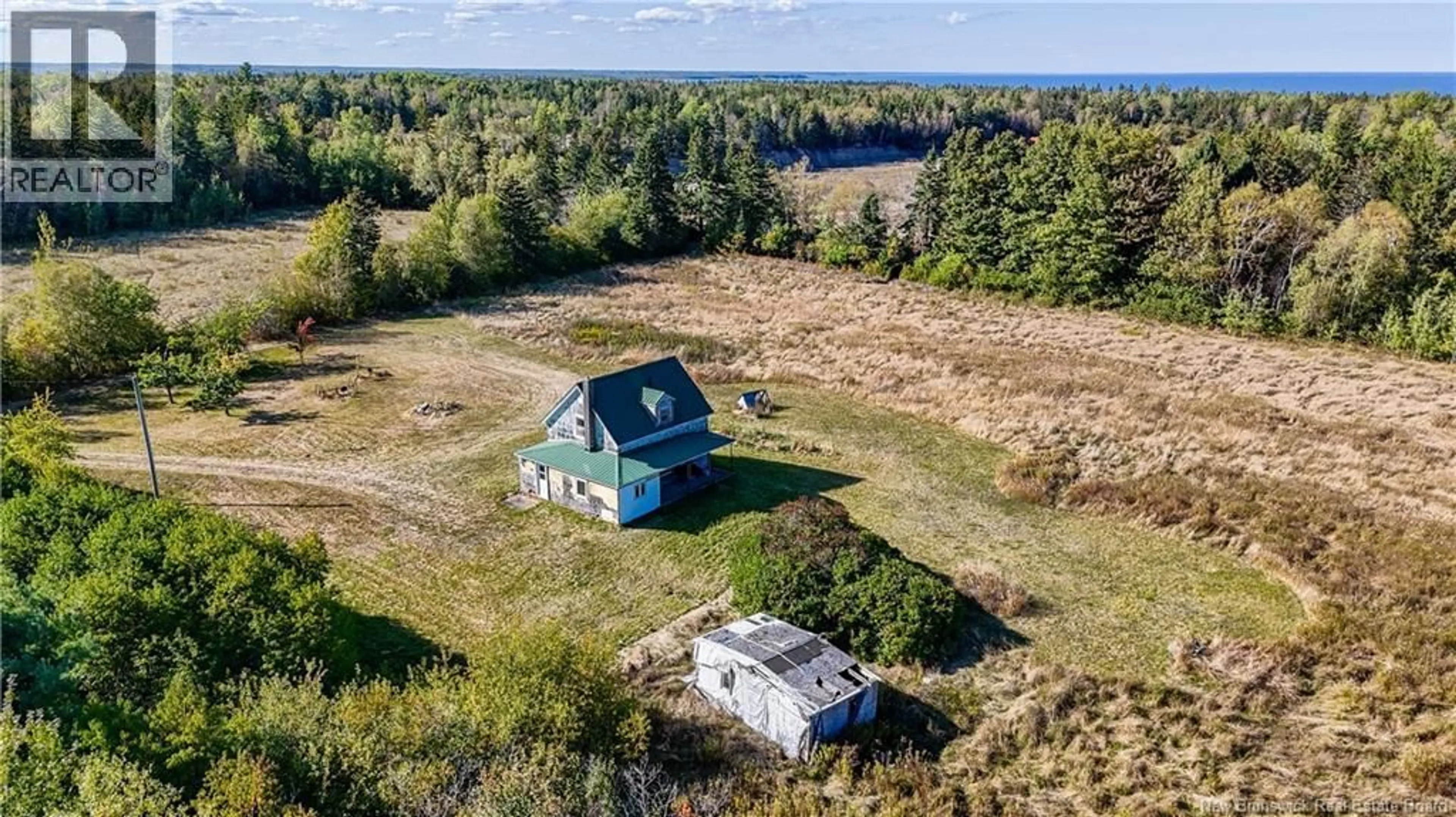 A pic from outside/outdoor area/front of a property/back of a property/a pic from drone, water/lake/river/ocean view for 214 ALLEE DE L'ECOLE, Grande-Digue New Brunswick E4R3S2