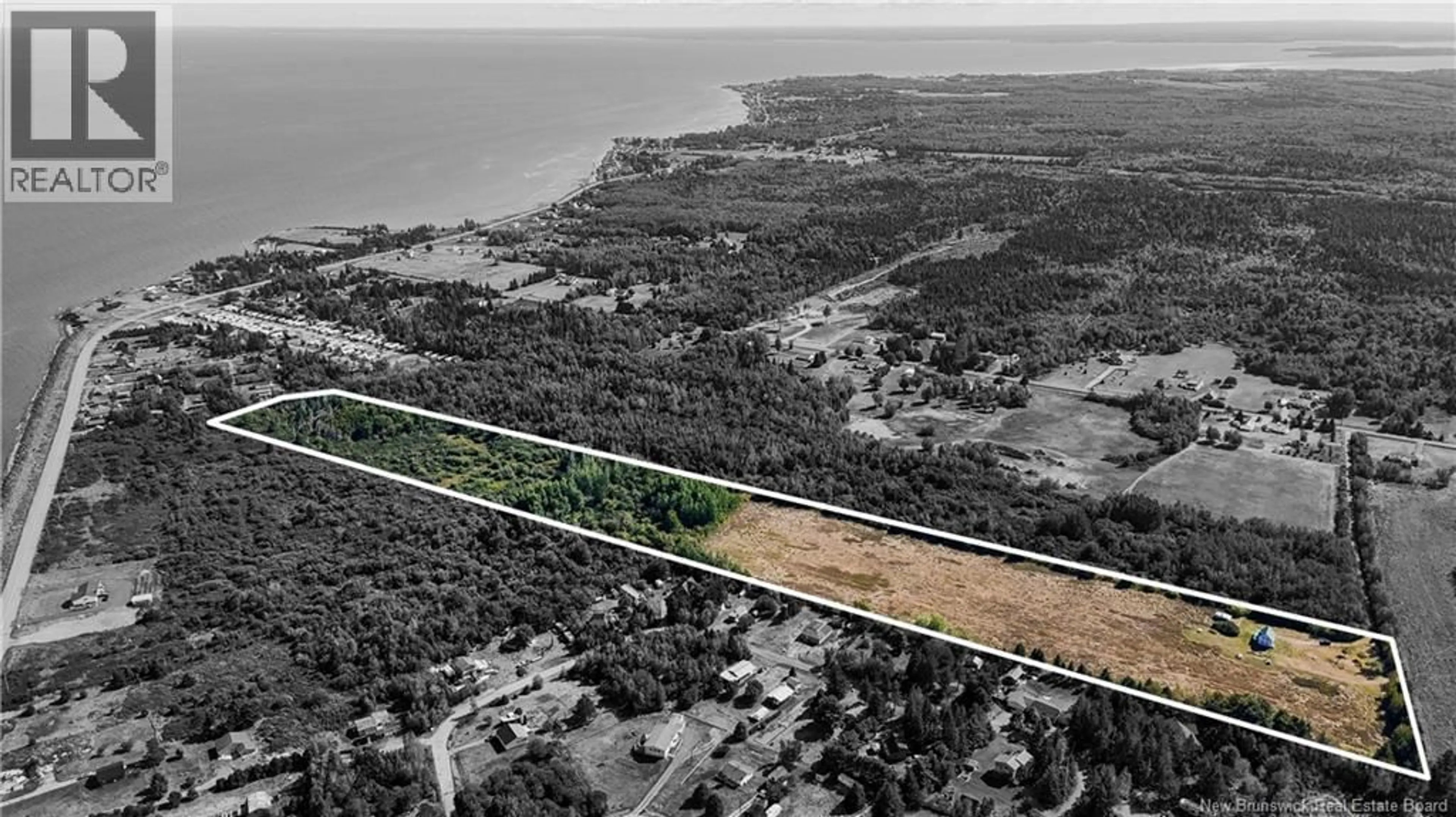 A pic from outside/outdoor area/front of a property/back of a property/a pic from drone, water/lake/river/ocean view for 214 ALLEE DE L'ECOLE, Grande-Digue New Brunswick E4R3S2
