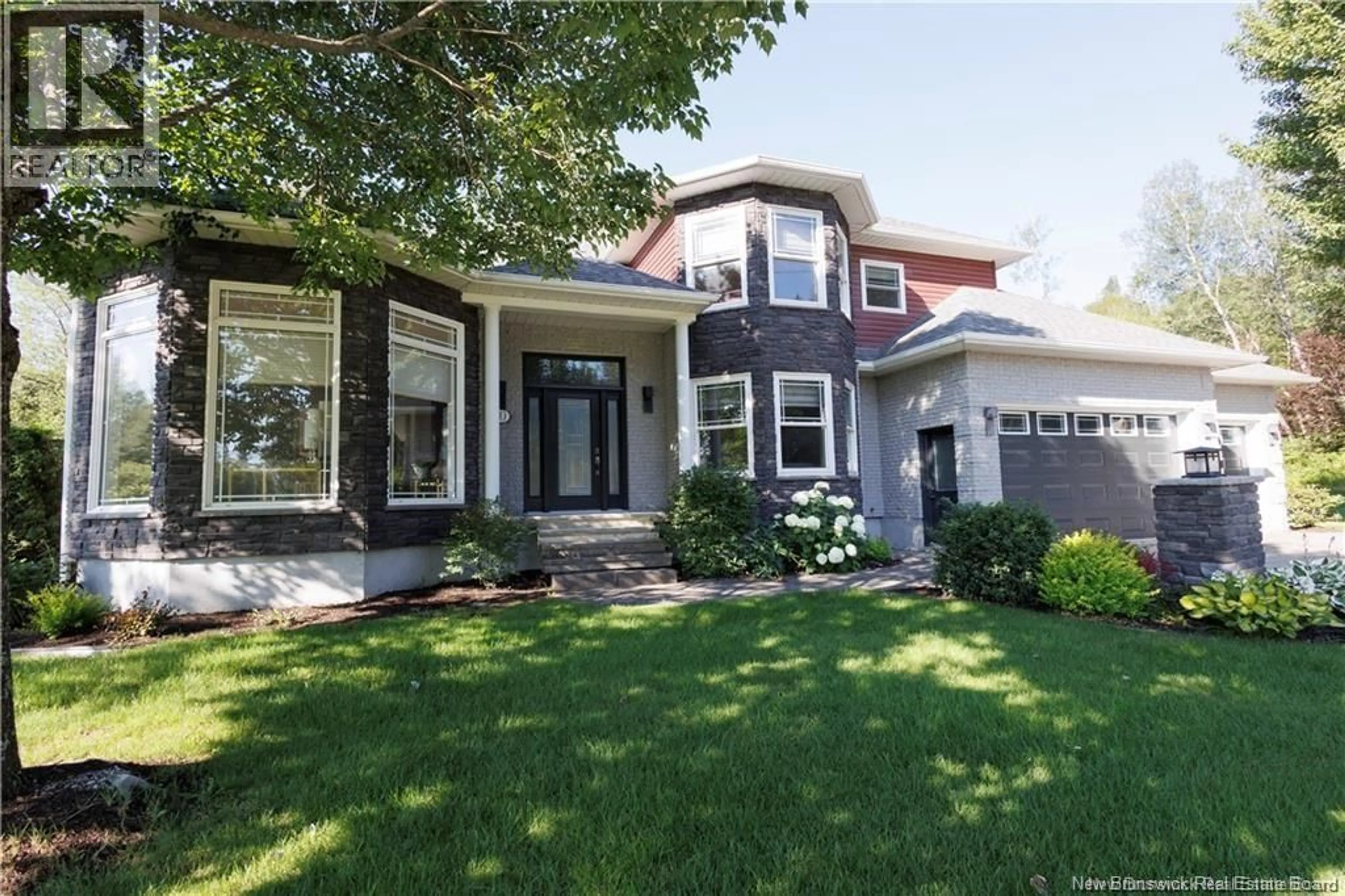 Home with vinyl exterior material, street for 70 RIVER ROAD, Grand-Sault/Grand Falls New Brunswick E3Z1R6