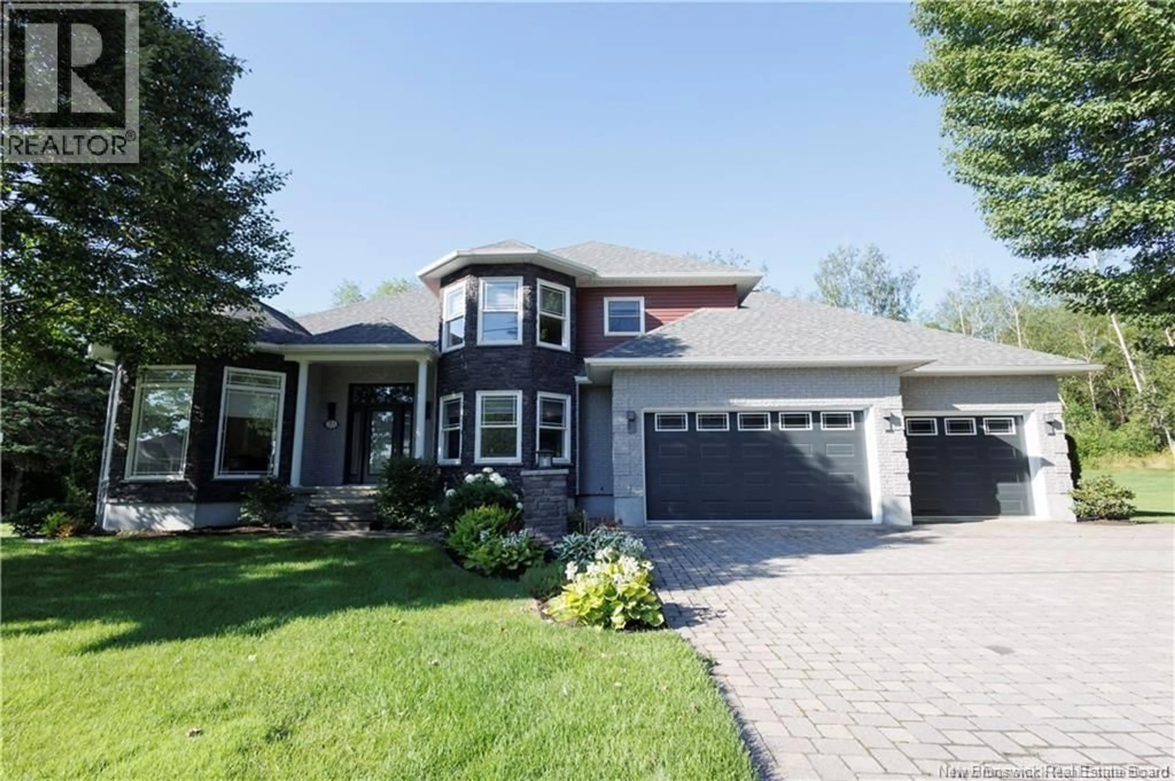 Home with brick exterior material, street for 70 RIVER ROAD, Grand-Sault/Grand Falls New Brunswick E3Z1R6