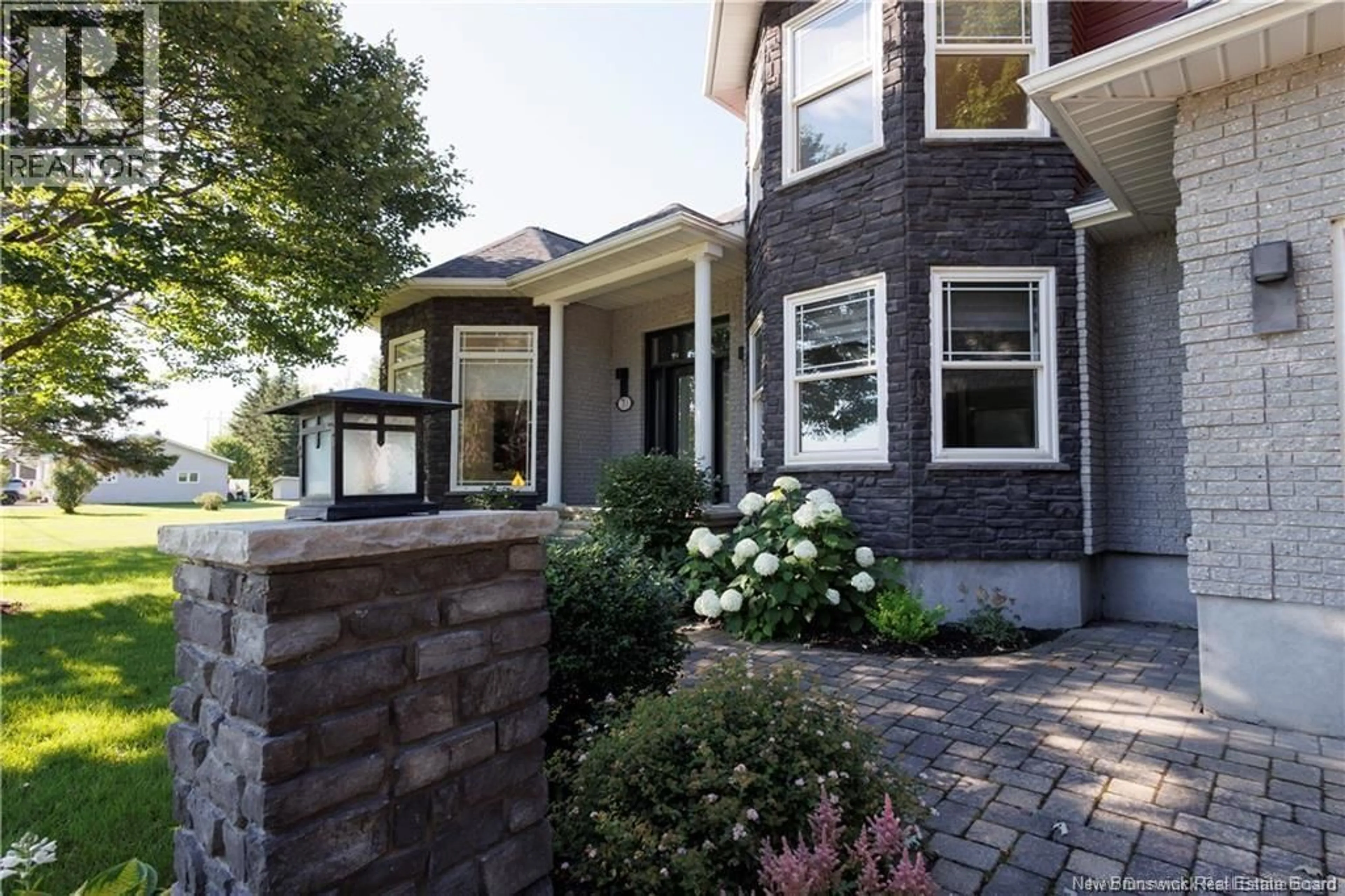 Home with brick exterior material, street for 70 RIVER ROAD, Grand-Sault/Grand Falls New Brunswick E3Z1R6