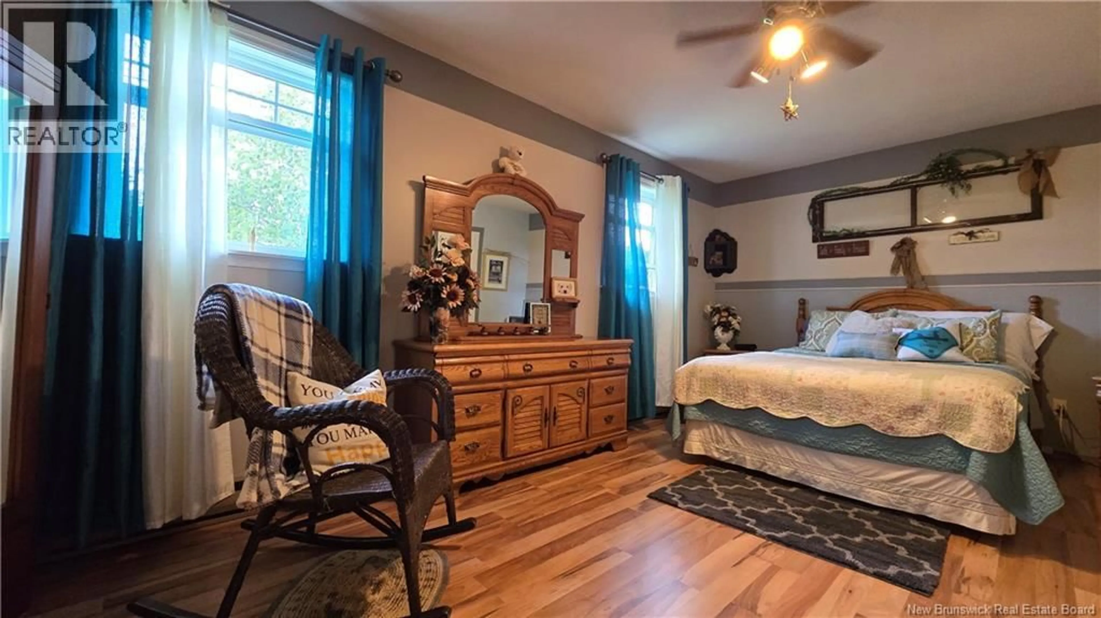 Bedroom with bed, wood/laminate floor for 2 CHOUINARD STREET, Eel River Crossing New Brunswick E8E1P3