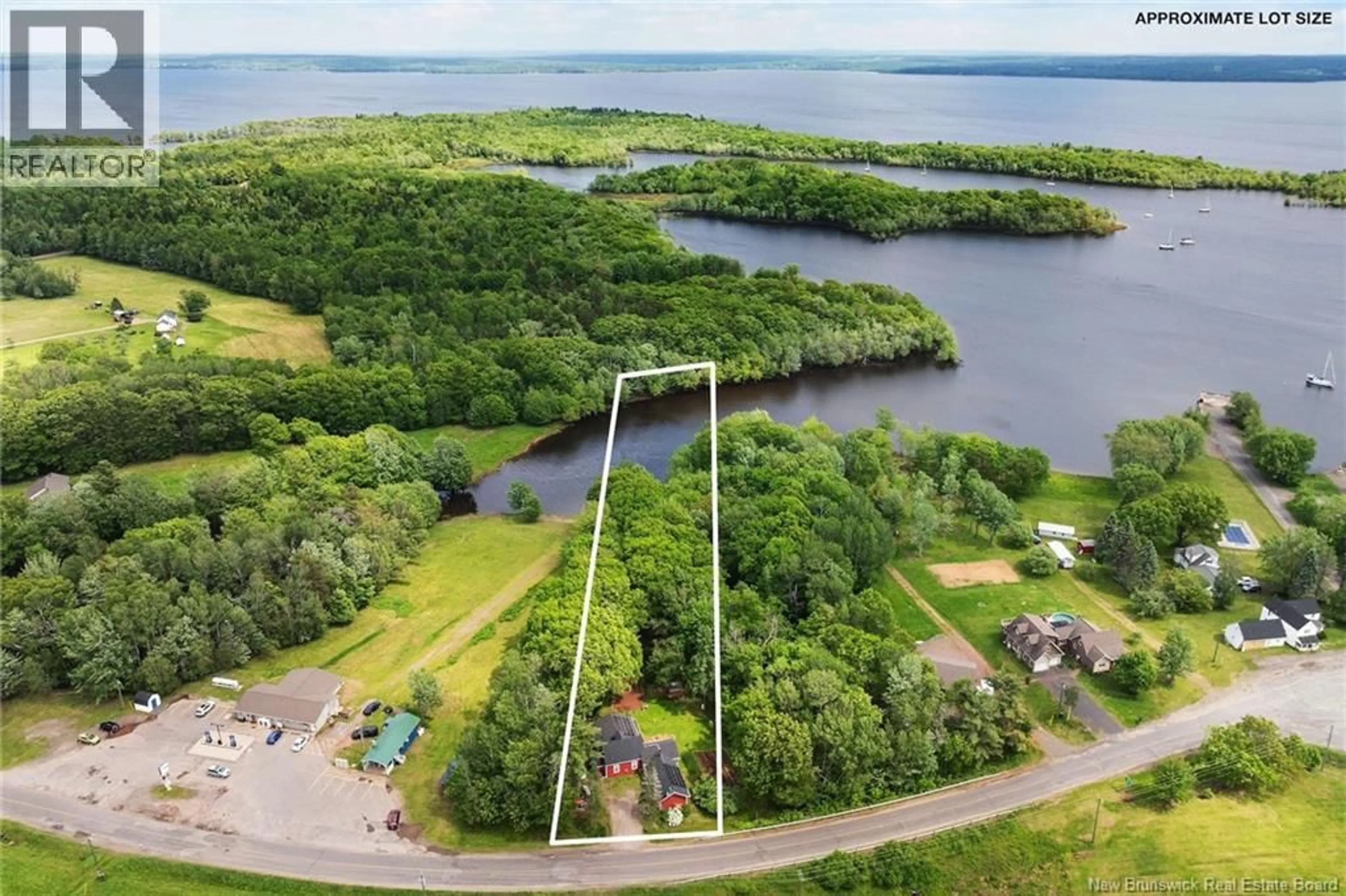 A pic from outside/outdoor area/front of a property/back of a property/a pic from drone, water/lake/river/ocean view for 2038 ROUTE 690, Douglas Harbour New Brunswick E4B1Y7