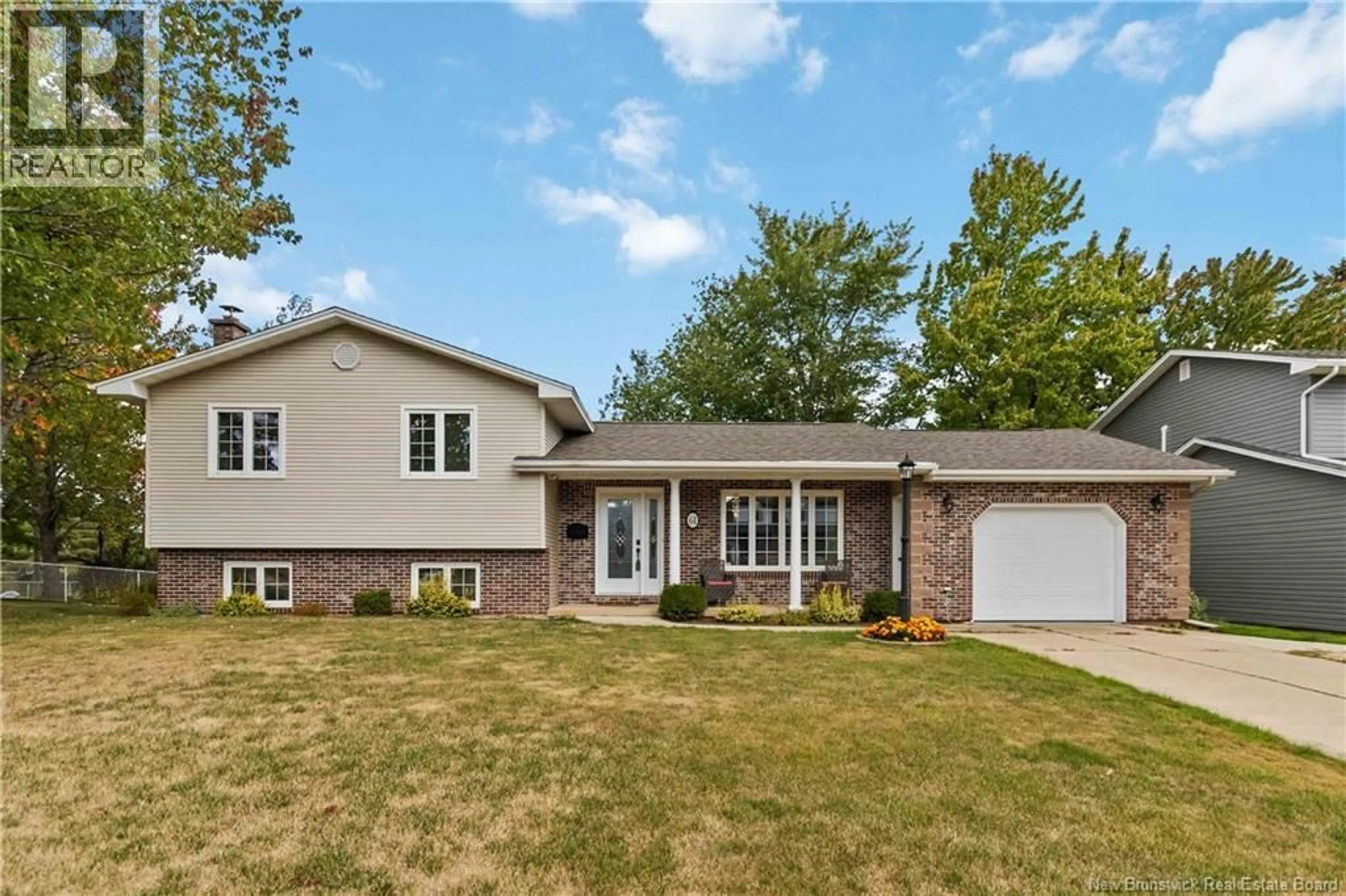 Home with vinyl exterior material, street for 61 TEAKWOOD WAY, Moncton New Brunswick E1G1T3