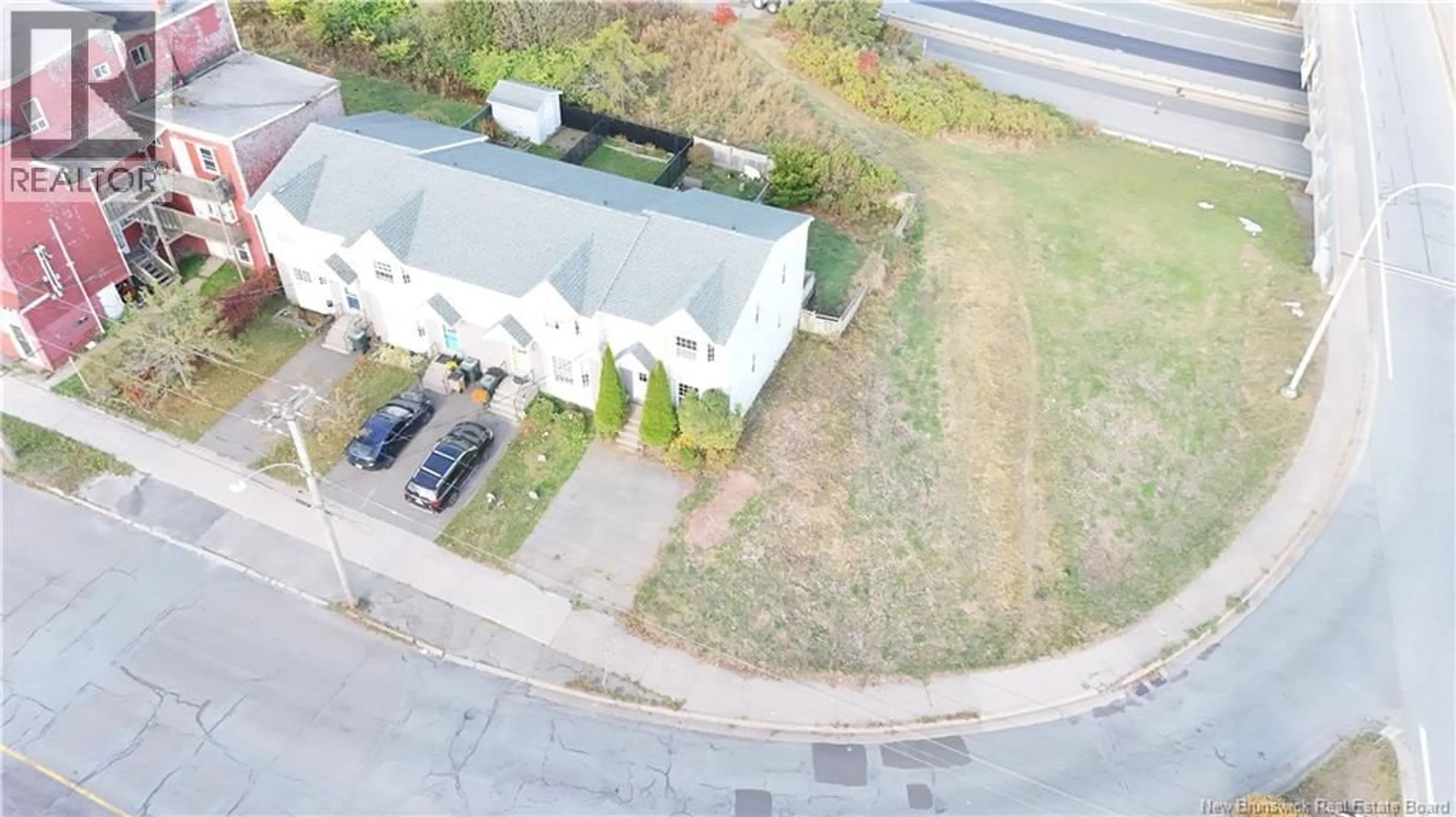 A pic from outside/outdoor area/front of a property/back of a property/a pic from drone, street for 193 KING STREET, Saint John New Brunswick E2M1S7