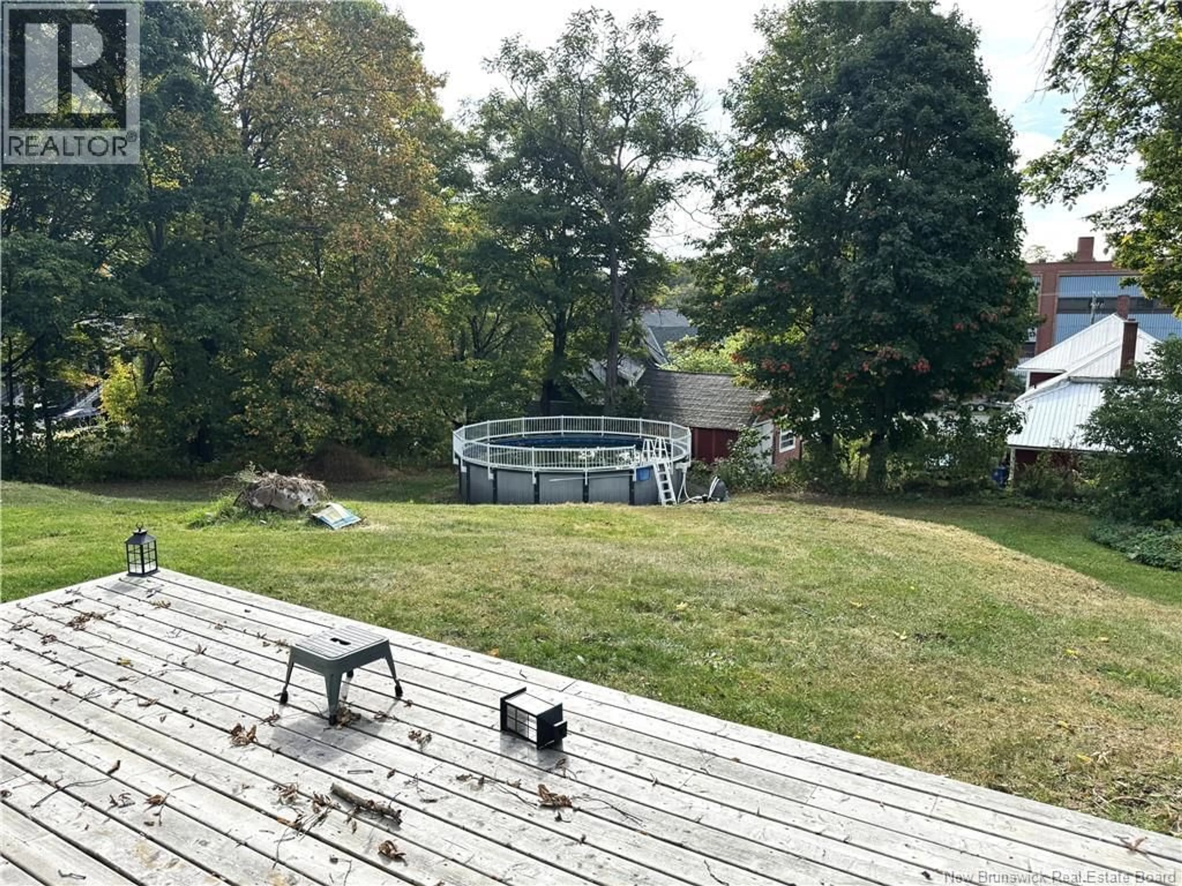 A pic from outside/outdoor area/front of a property/back of a property/a pic from drone, water/lake/river/ocean view for 113 SAINT JOHN STREET, Woodstock New Brunswick E7M2T8