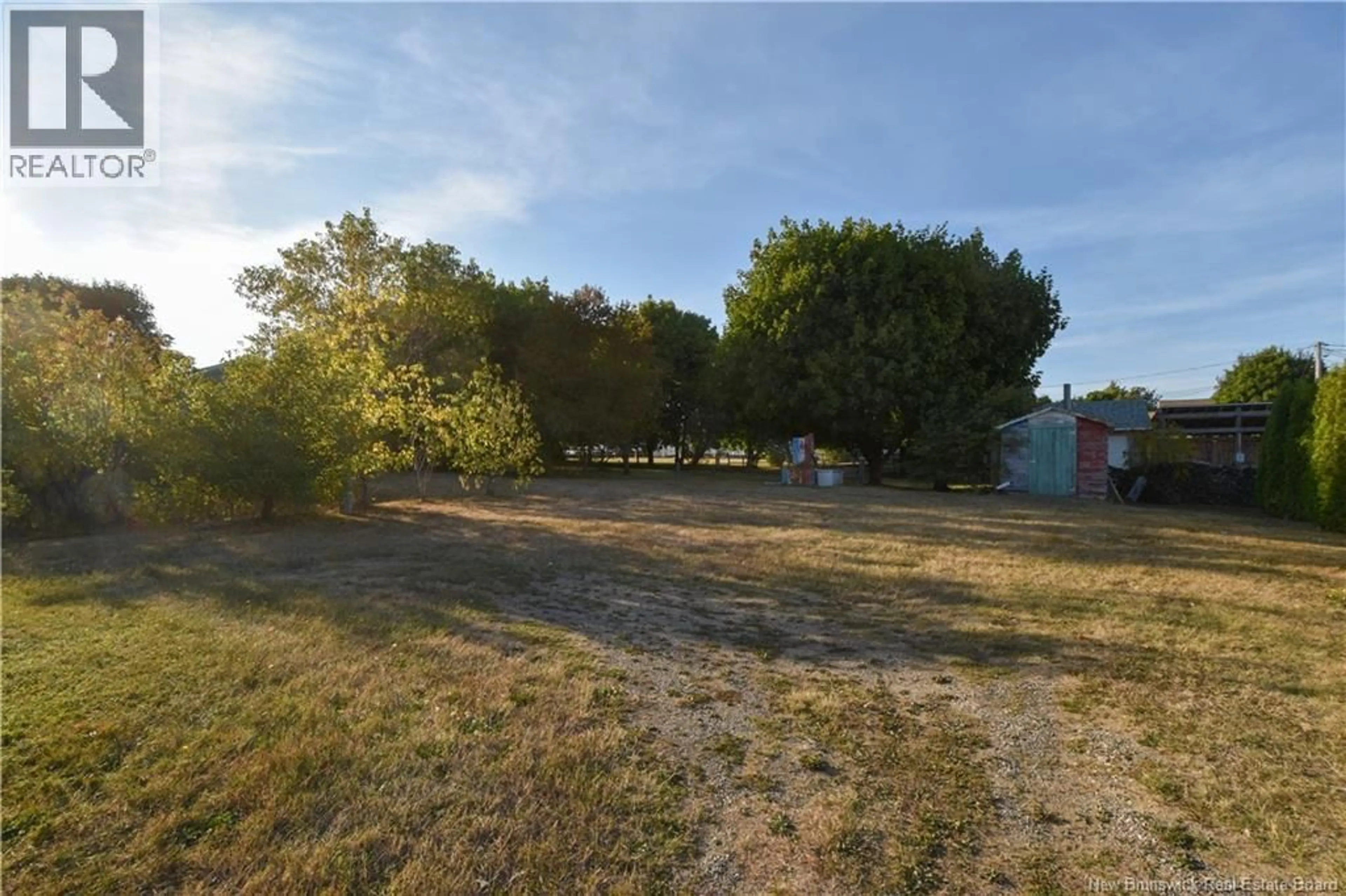 A pic from outside/outdoor area/front of a property/back of a property/a pic from drone, forest/trees view for 455 GEORGES OUEST, Tracadie New Brunswick E1X1C8