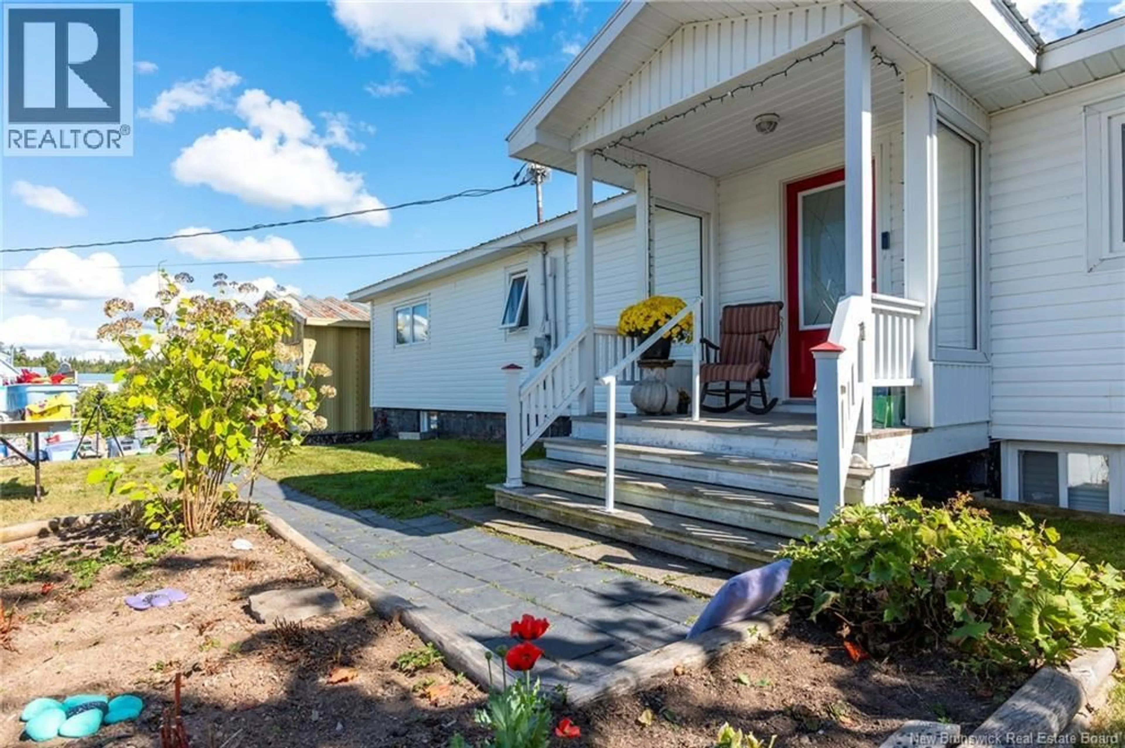 Home with vinyl exterior material, street for 62 MINK BROOK ROAD, Lepreau New Brunswick E5J2P5