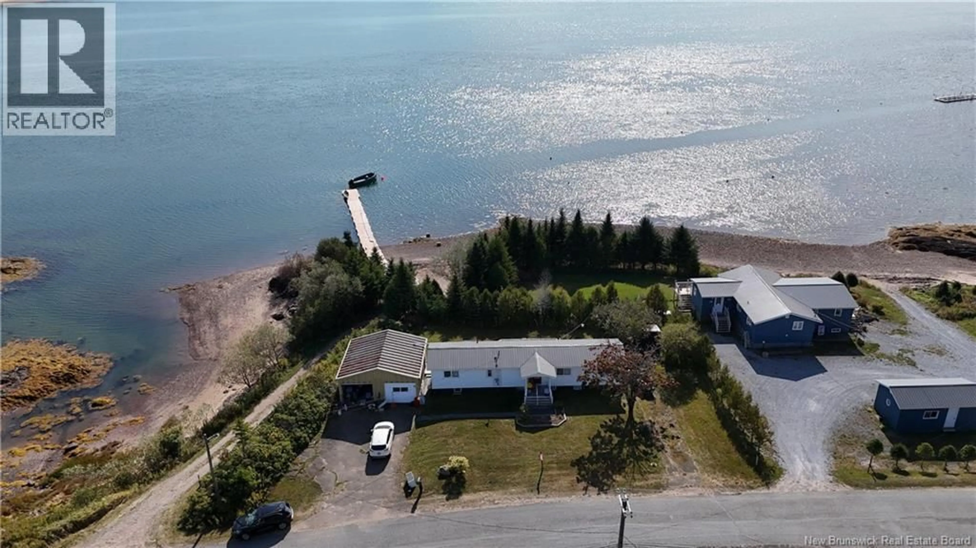 A pic from outside/outdoor area/front of a property/back of a property/a pic from drone, water/lake/river/ocean view for 62 MINK BROOK ROAD, Lepreau New Brunswick E5J2P5