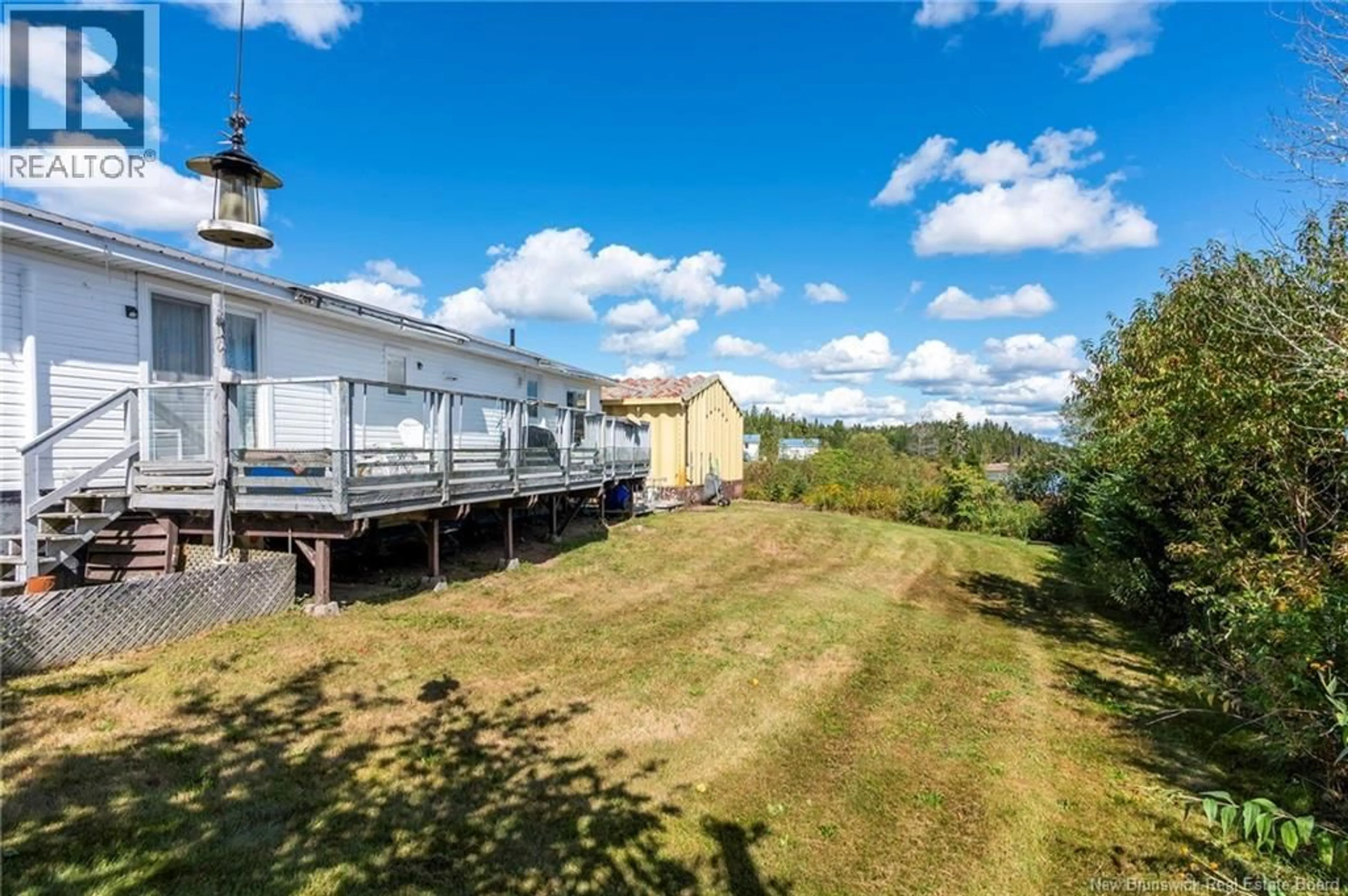 A pic from outside/outdoor area/front of a property/back of a property/a pic from drone, water/lake/river/ocean view for 62 MINK BROOK ROAD, Lepreau New Brunswick E5J2P5