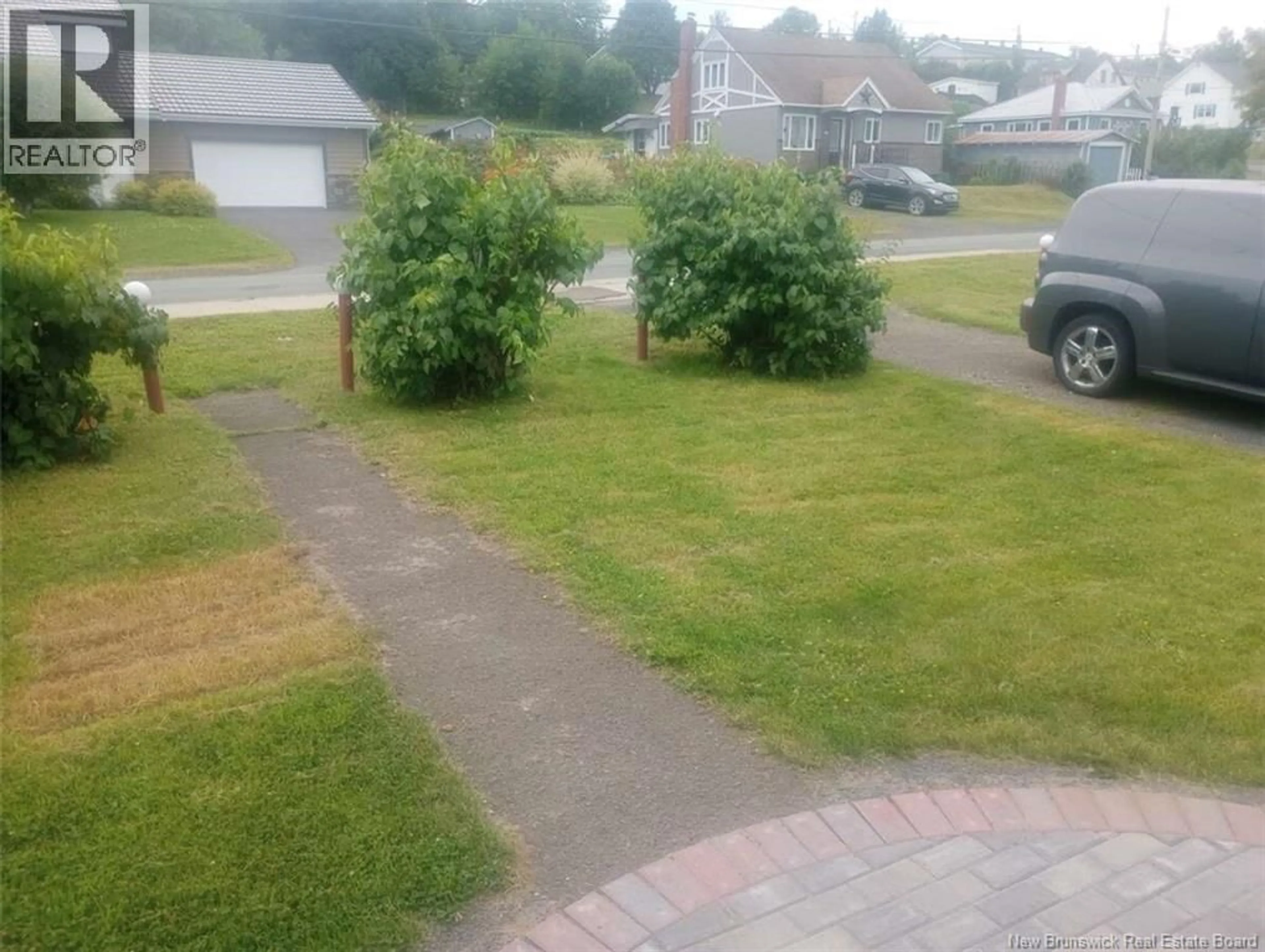 A pic from outside/outdoor area/front of a property/back of a property/a pic from drone, street for 371 GODERICH STREET, Dalhousie New Brunswick E8C1V2
