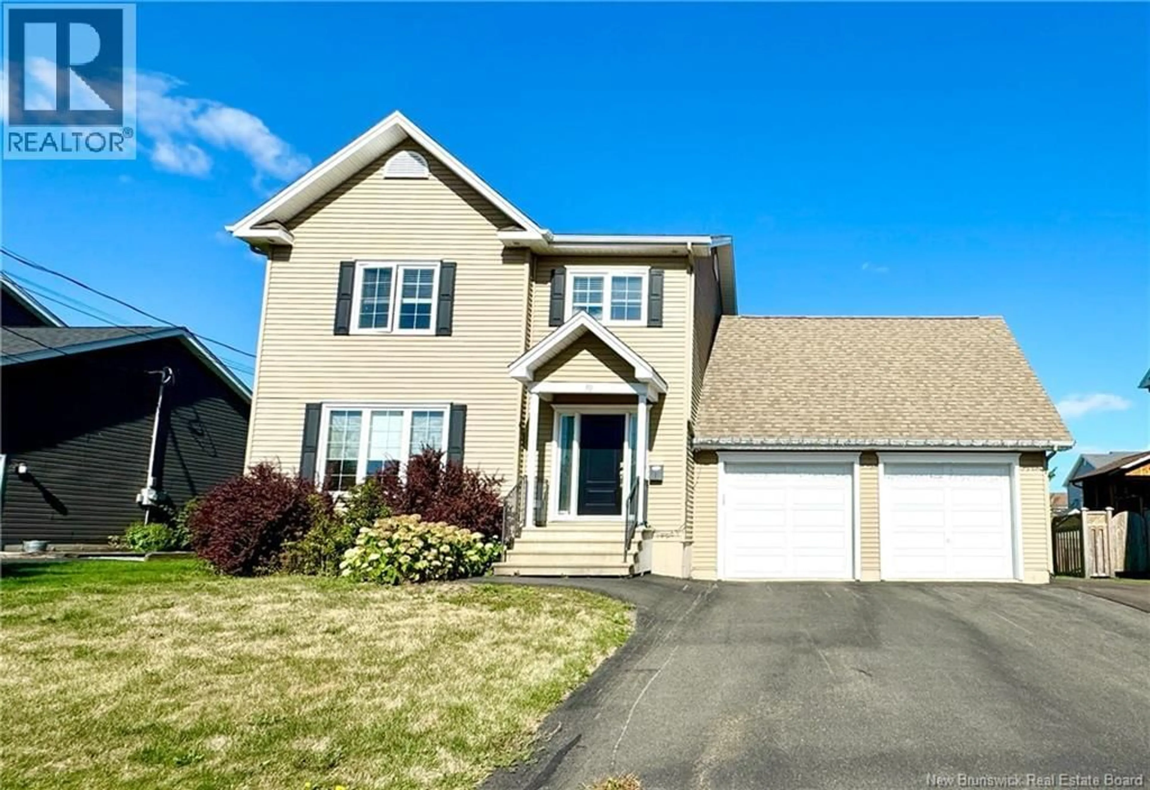 Home with vinyl exterior material, street for 39 FOREST GROVE ROAD, Moncton New Brunswick E1G5K6