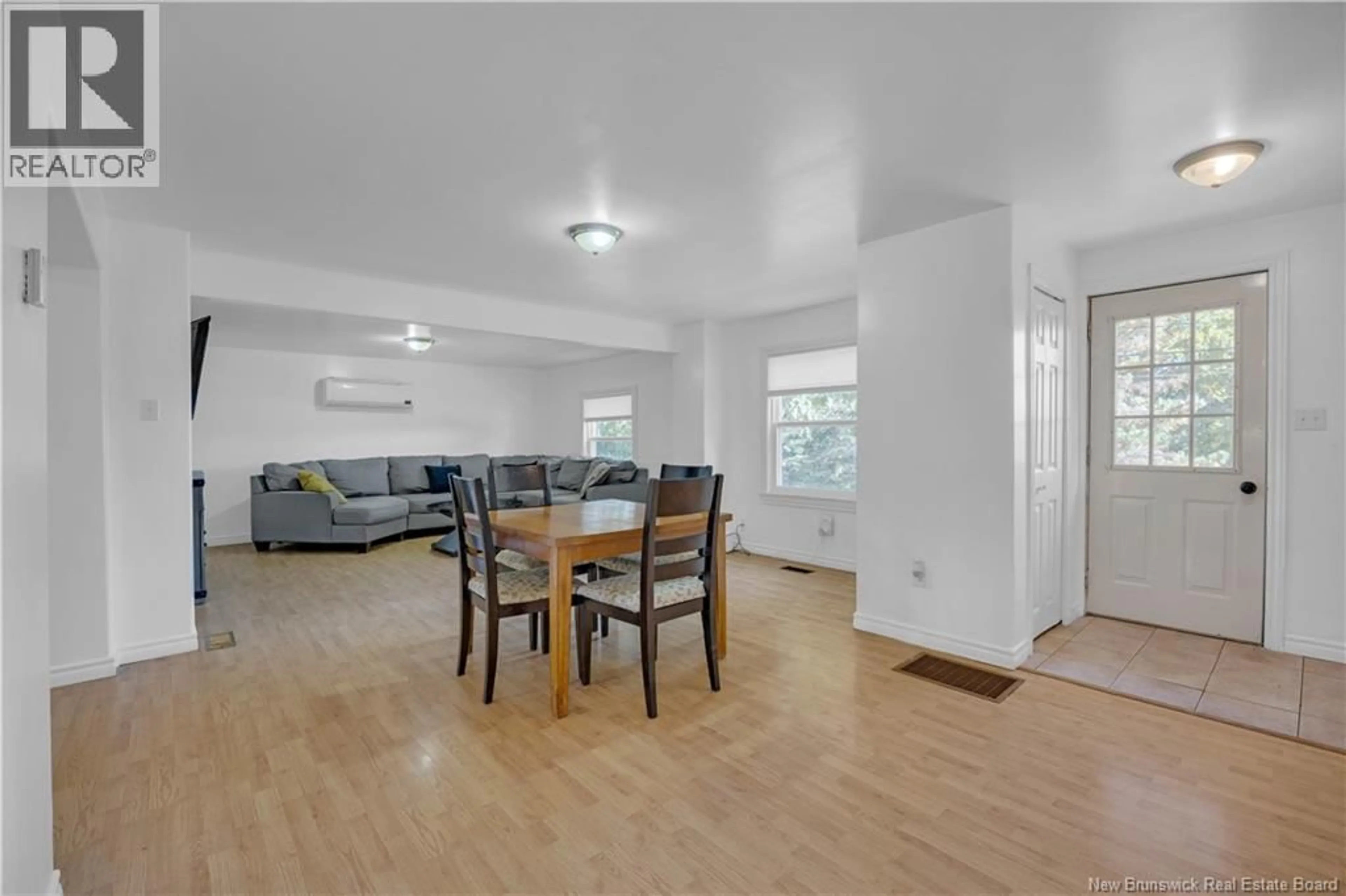 Living room with furniture, wood/laminate floor for 34 SAINT PAUL'S STREET, Hampton New Brunswick E5N5P9