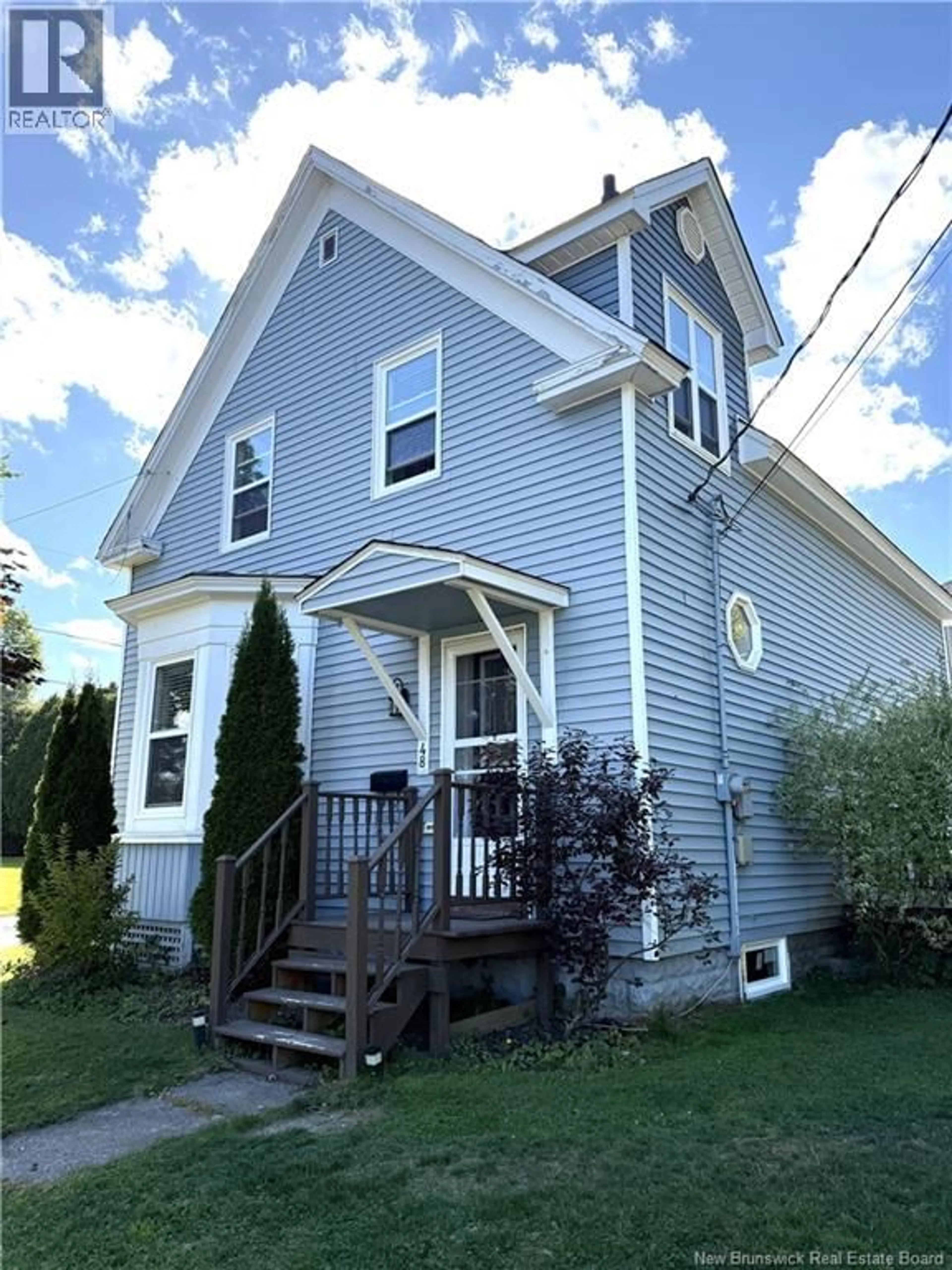 Home with vinyl exterior material, street for 48 MAIN STREET, St. Stephen New Brunswick E3L1Z6